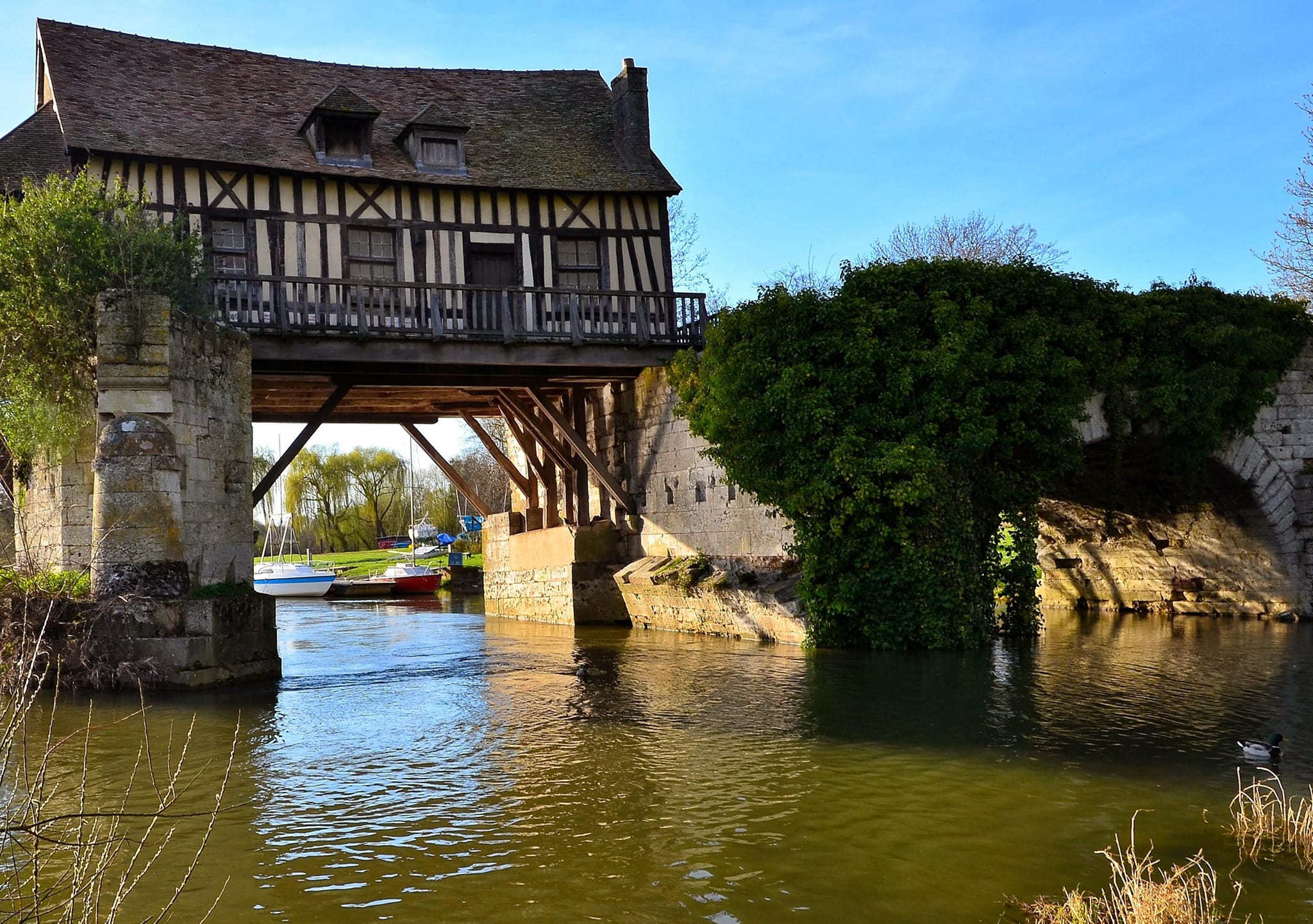 Which version of Ambleside's Bridge House do you prefer, then or now?