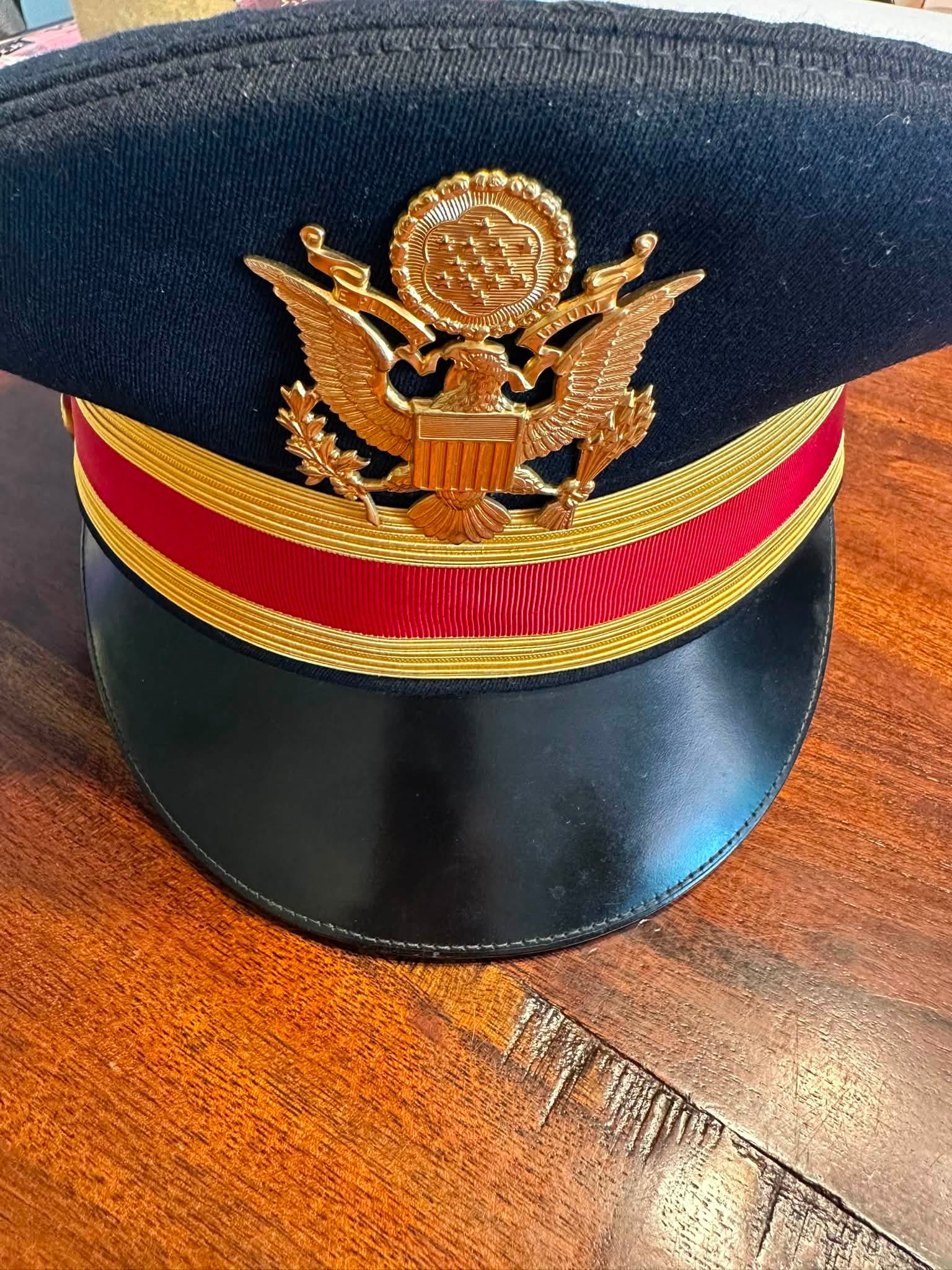 Military cap found at Amy's Armoire, seeking owner or family