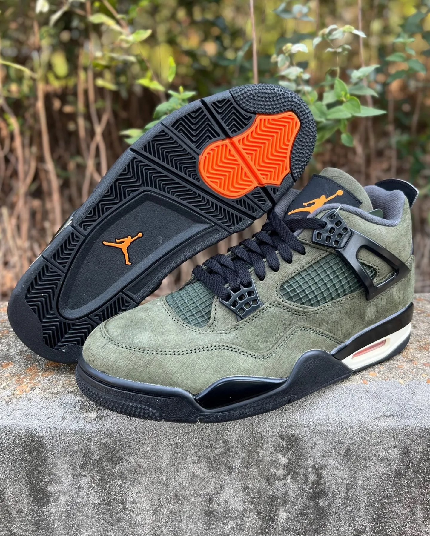Undefeated x Air Jordan 4 Color: Deep Green/Clementine-Black-Sail 