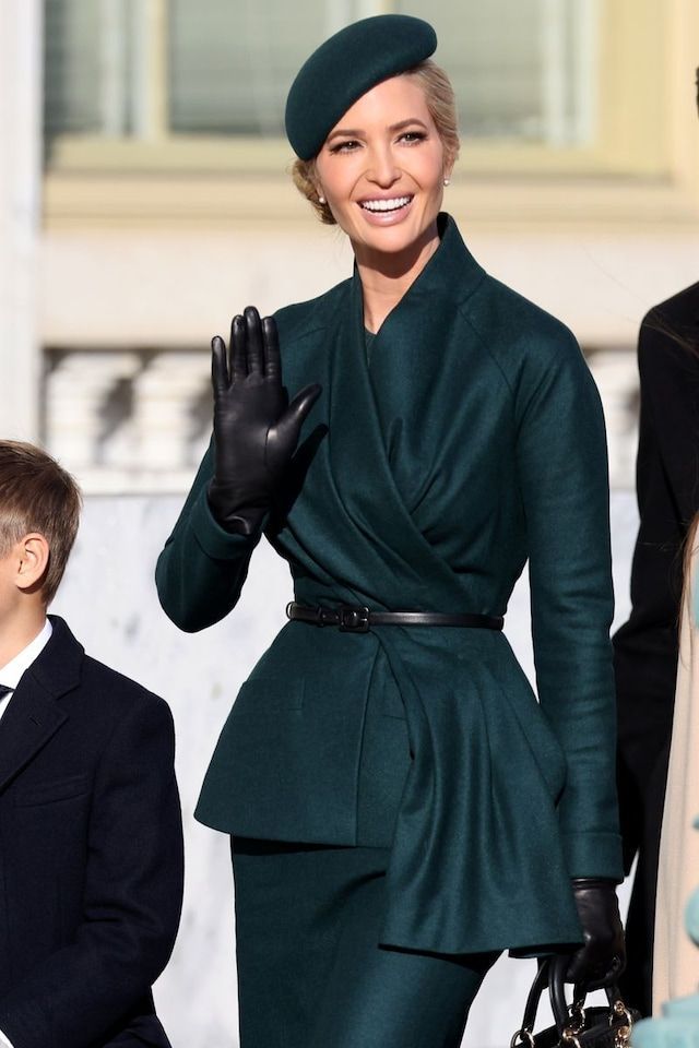 ivanka trump's green dress Trump made a chic statement at Donald second inauguration, wearing a forest skirt suit with an asymmetrical belted jacket, paired with a matching hat, black leather gloves, and a sheer maxi dress for party
