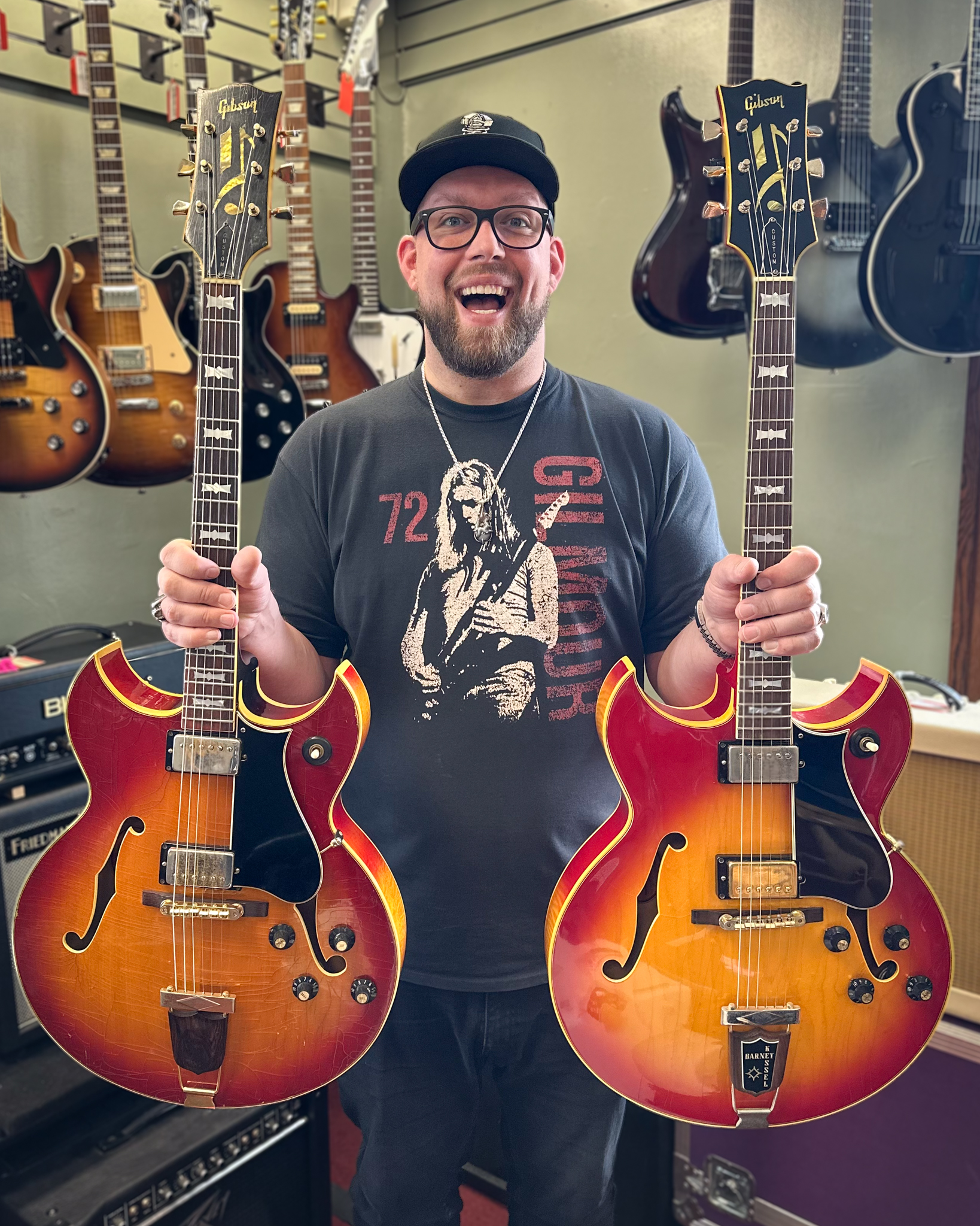 Double cutaways, doubled! On the left, a c.1966 Gibson Barney 