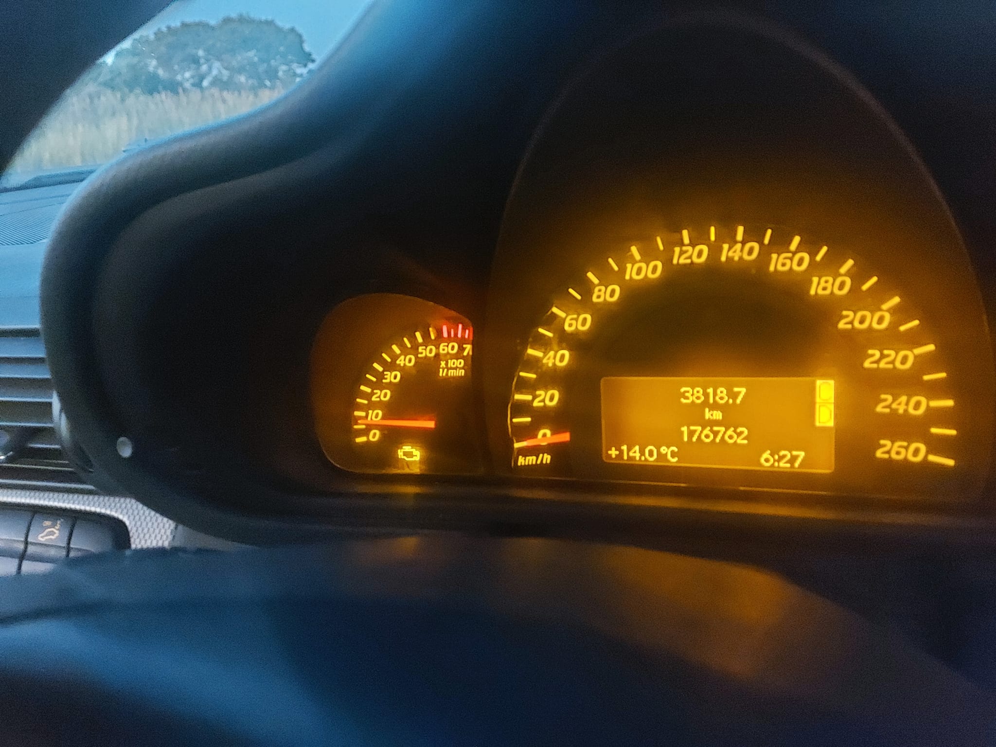 What is that little lamp indication/problem on the rev counter?