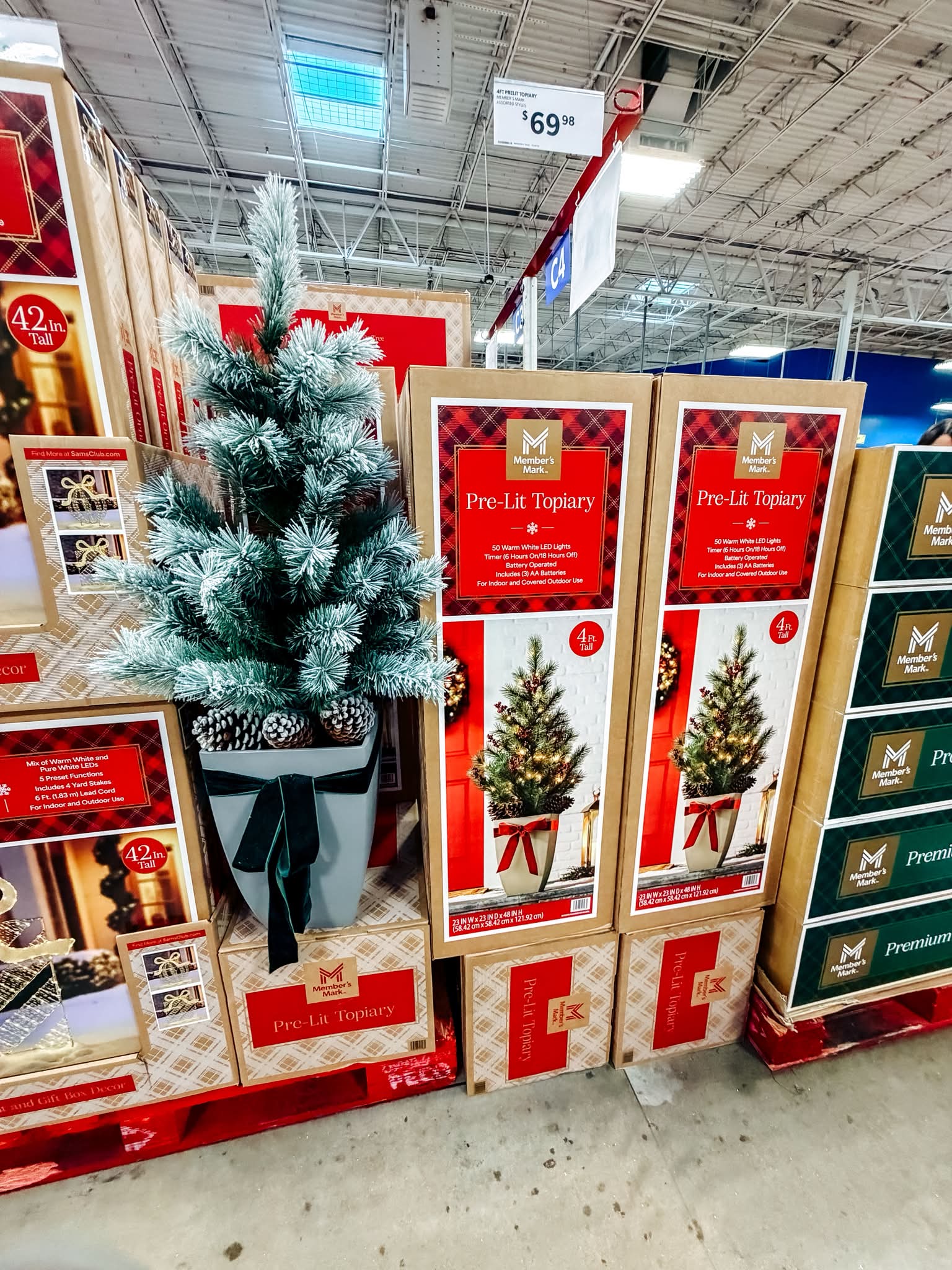 sam's club dress form christmas tree is coming in HOT 🎄😍 This 4 ft pre-lit topiary is SO pretty! The flocking, pinecones, bow + warm lights make it look way more expensive than it is Burnt Orange Bridesmaid Dresses For Guest Housed in a decorative Size:1314 Homegoods