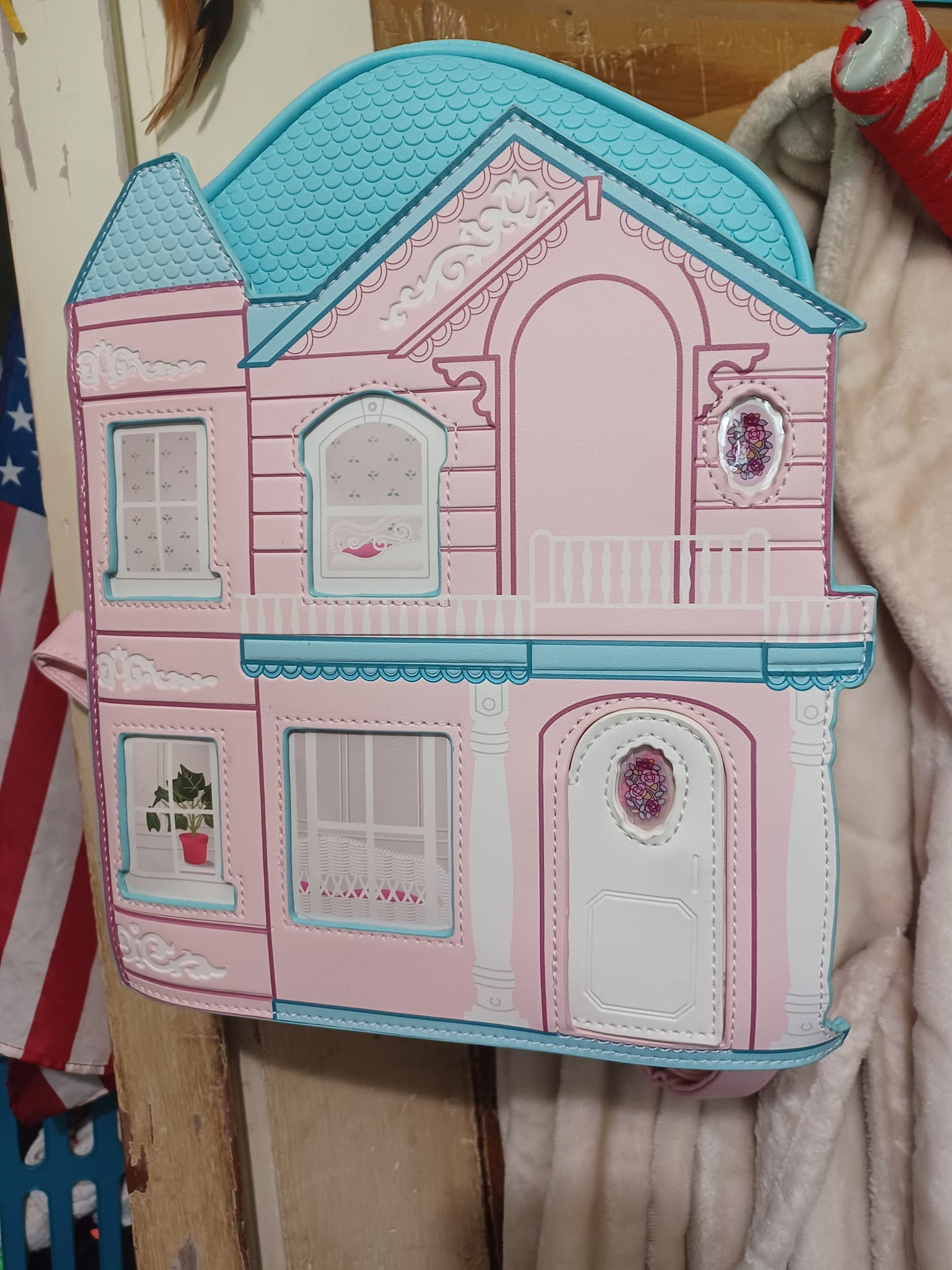 her universe barbie dreamhouse mini backpack Loungefly Fun in the Sun Pink-Multi From her origins as a teenage fashion model to her diverse range of careers Loungefly Mattel Classic Barbie Mini