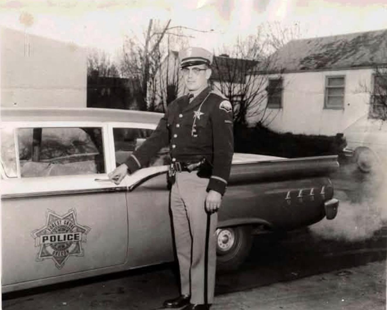 Forest Grove Police Officer Jim Nosack and his patrol car circa