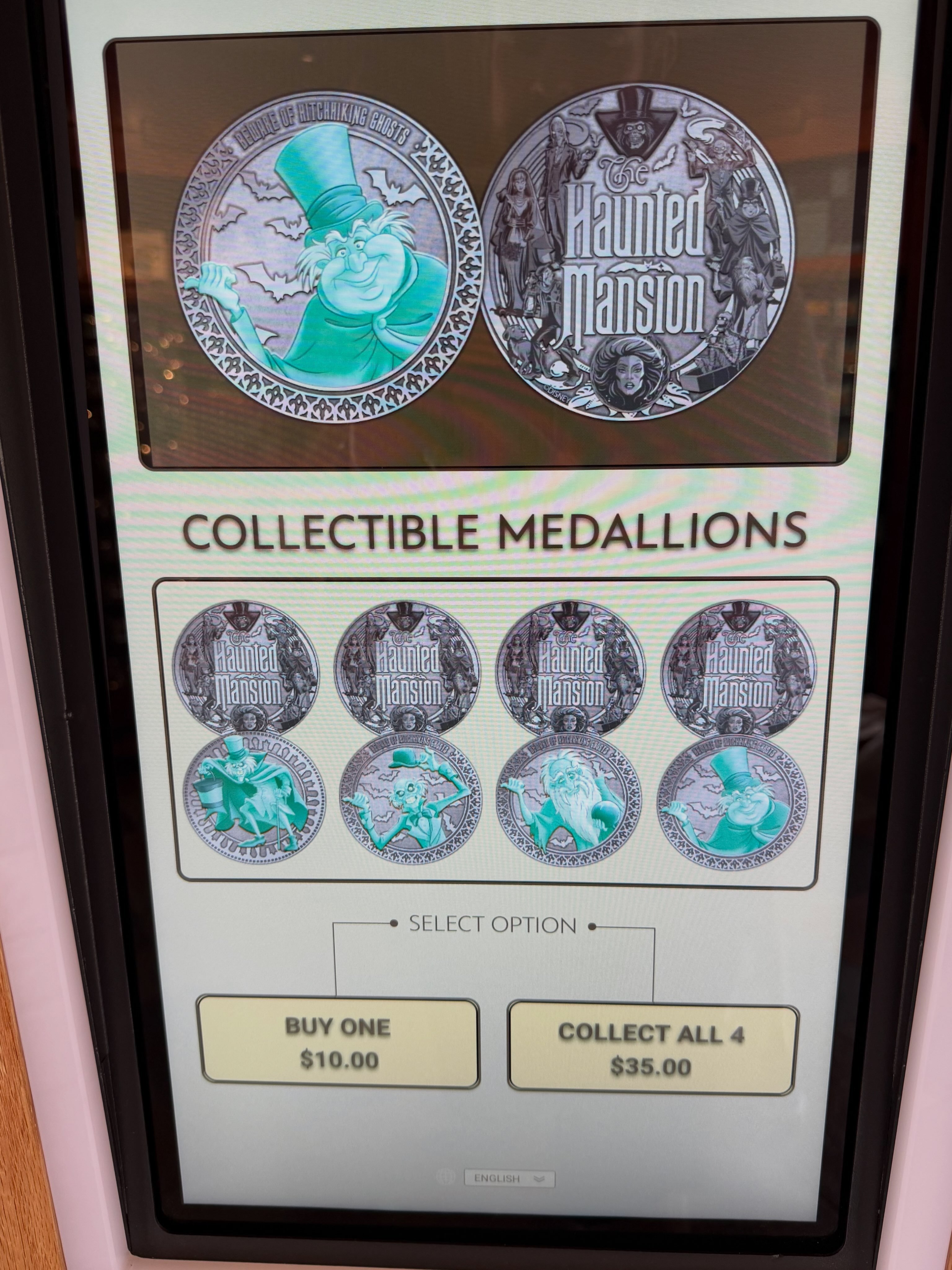 Haunted Mansion hitchhiking ghosts medallions at Disney Springs
