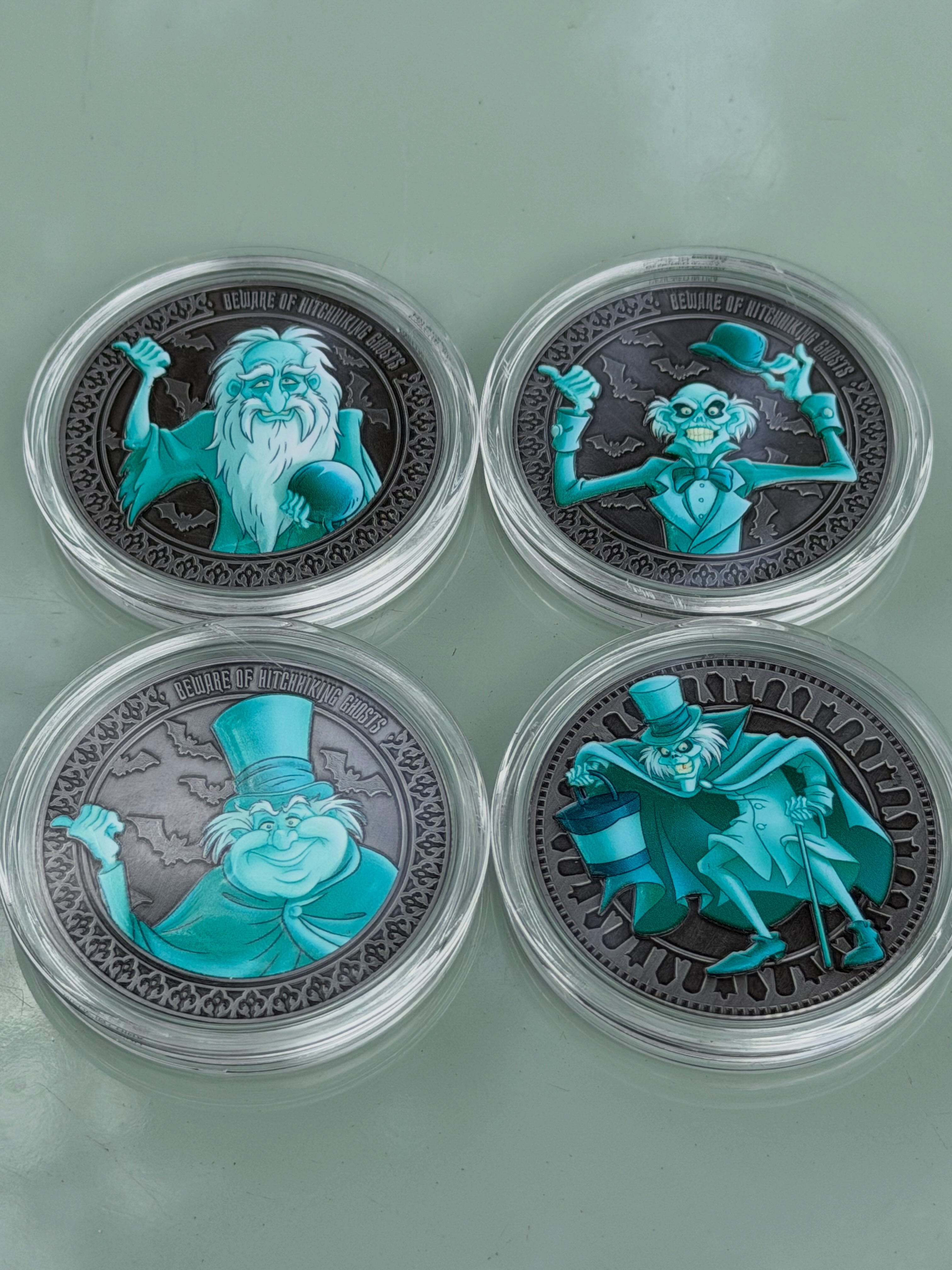 Haunted Mansion hitchhiking ghosts medallions at Disney Springs
