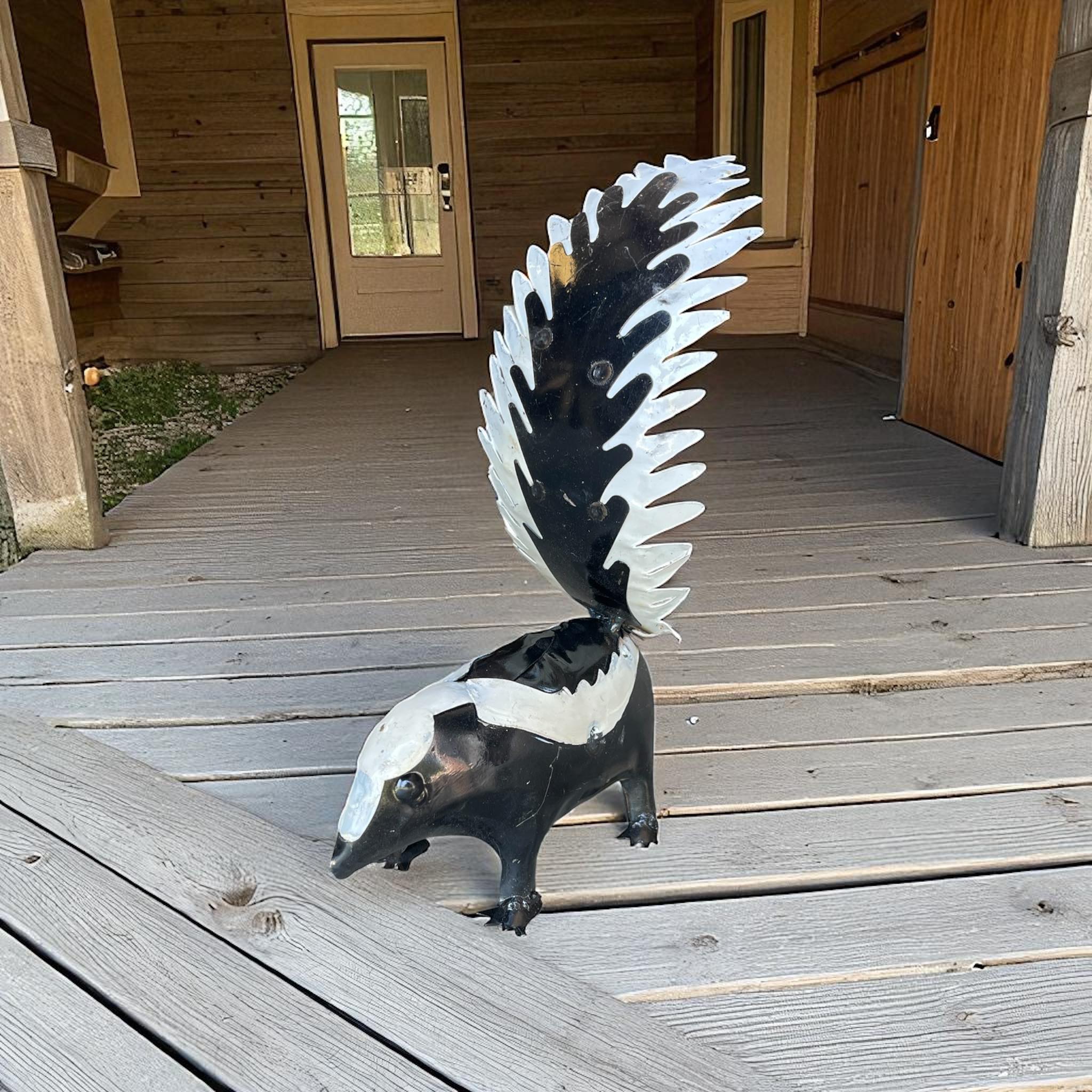 Duitsman’s - 🦨 No stink, all charm! 🦨 These adorable 12” tin skunks are ...