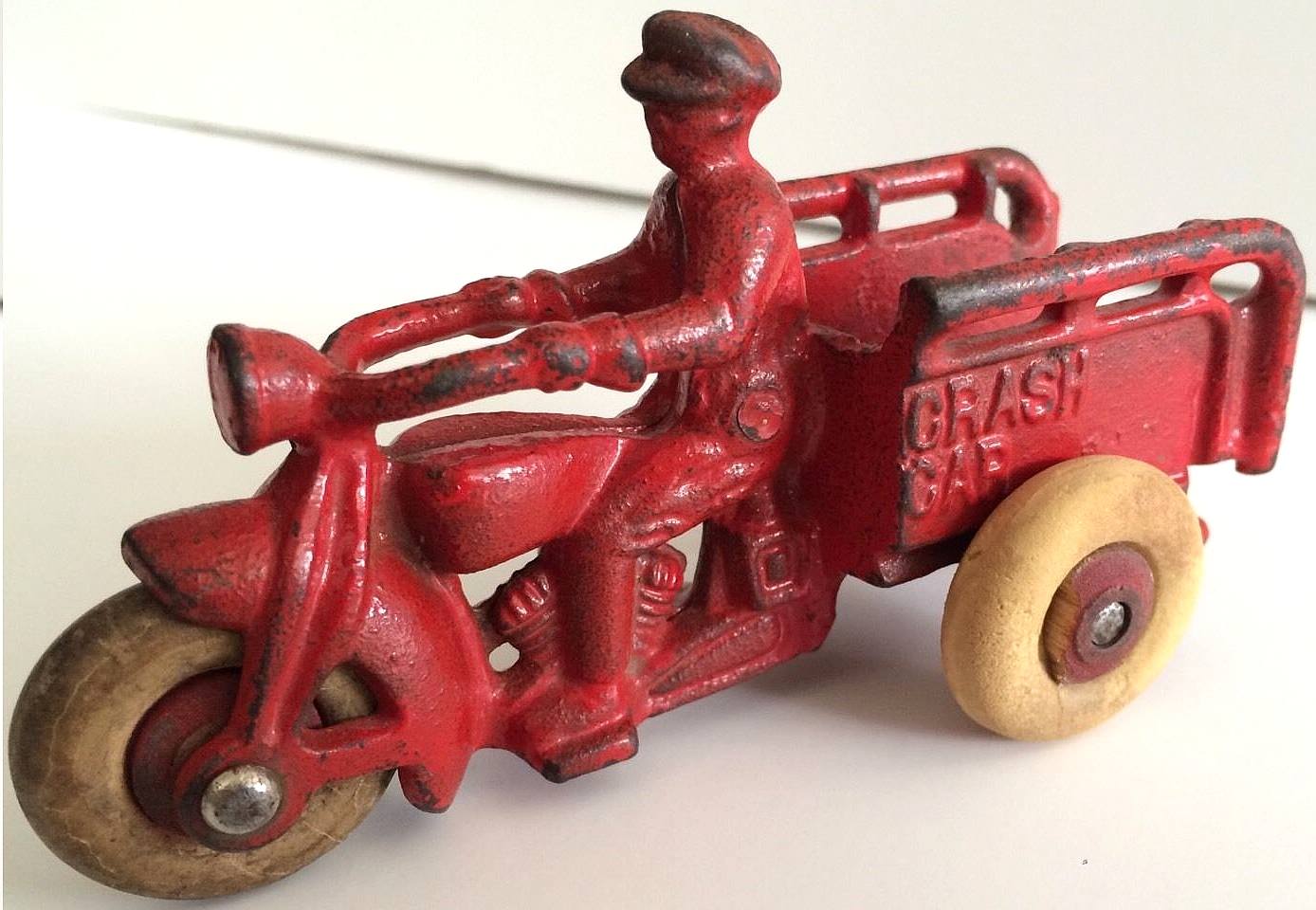 Rare 1930s Hubley cast iron motorcycle toys with Popeye driver