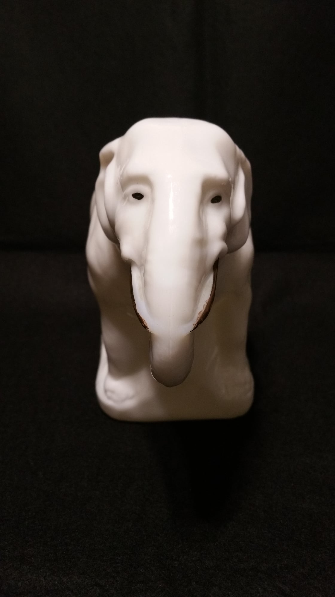 Collectible Fenton frosted glass mouse figurine is part of the