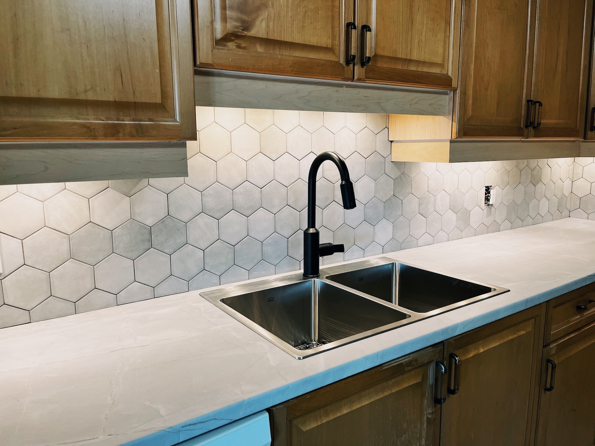 A beautiful tiling job for... - East Coast Countertops Ltd.