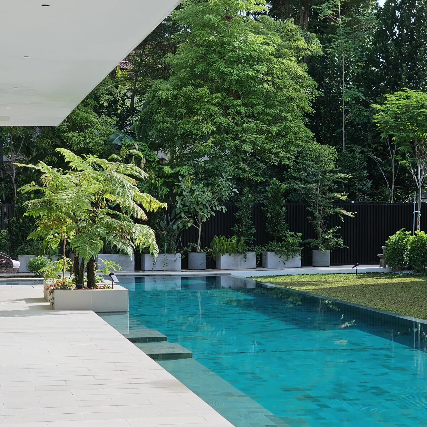 Ming Architects - A lap pool runs parallel to the main... | Facebook