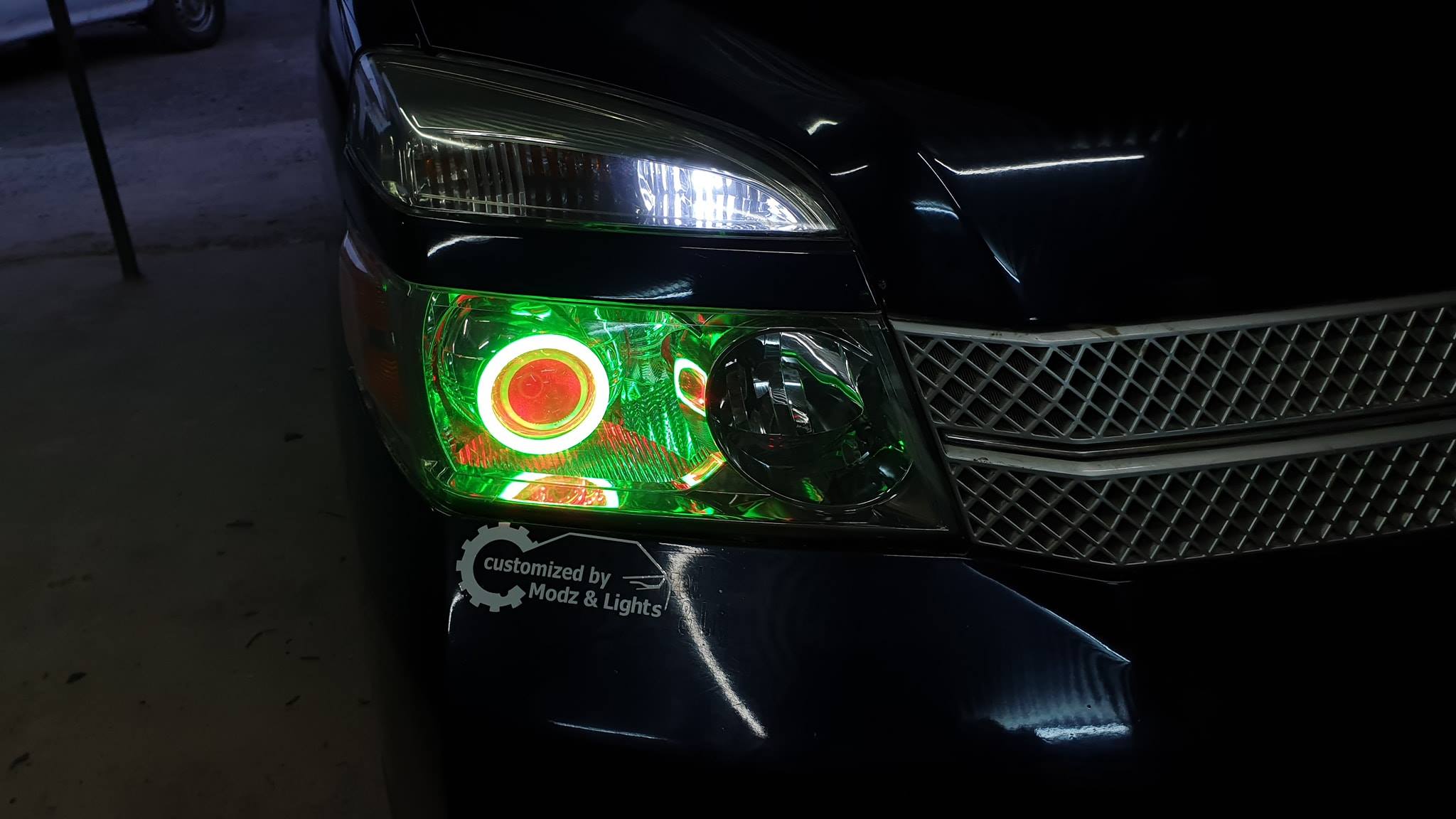 Toyota Voxy fitted with Bixenon projector lenses and Mobile 