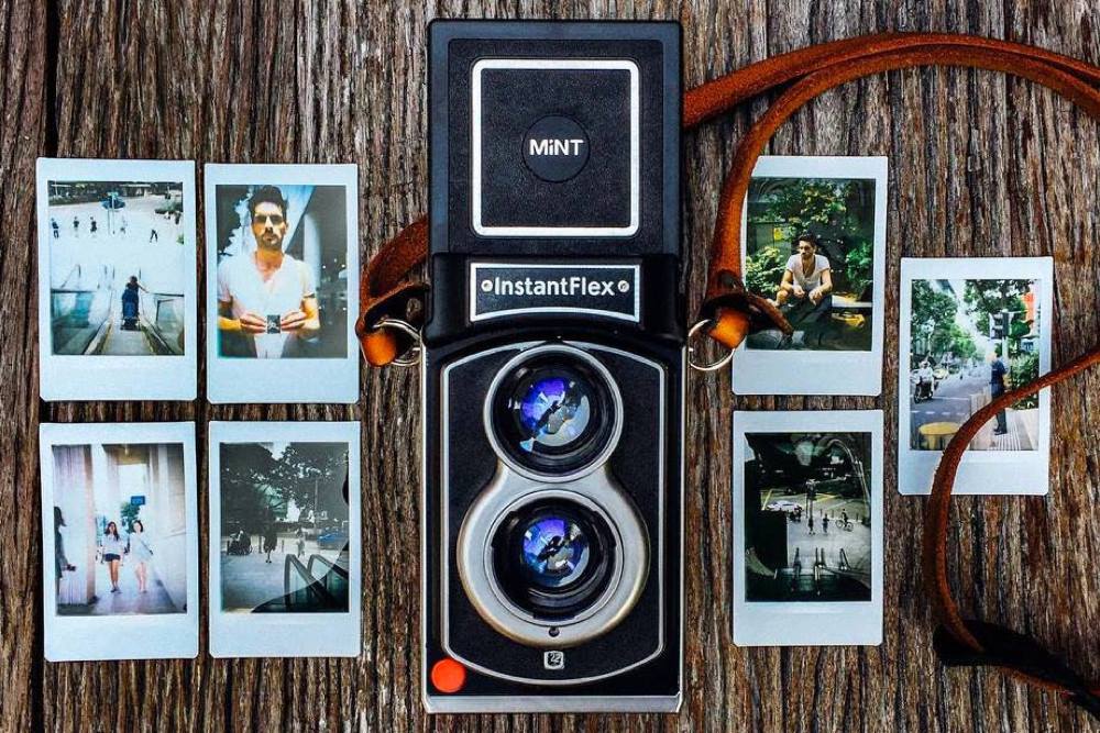 J One Camera - Introducing the MiNT InstantFlex TL-70! The...