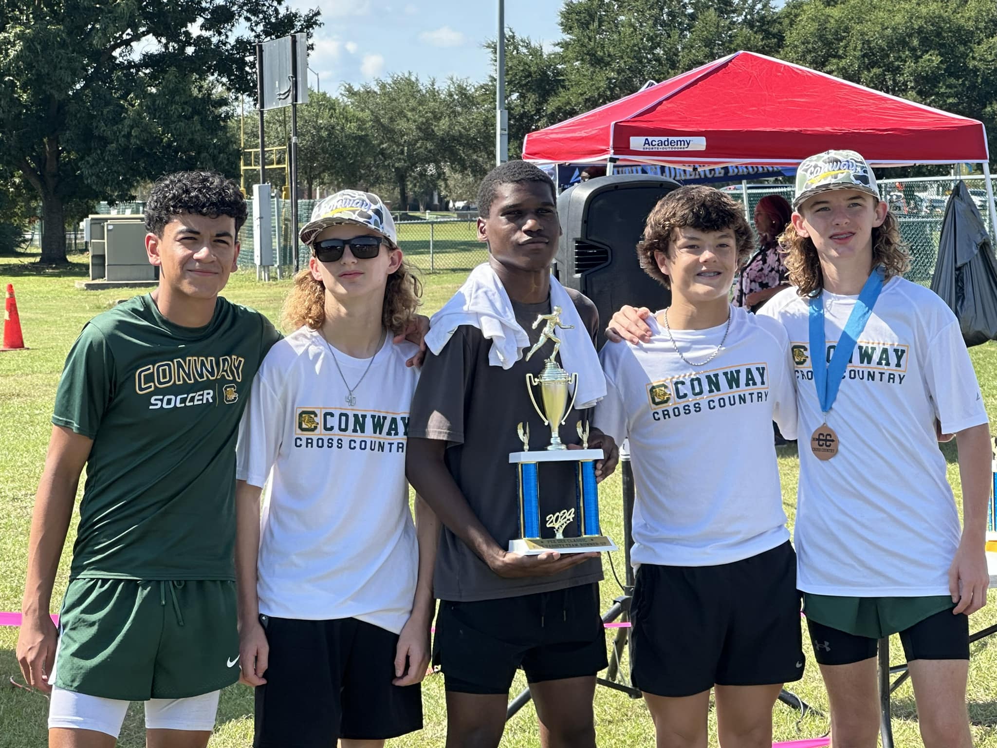 The Conway boys cross country team... - Conway High School