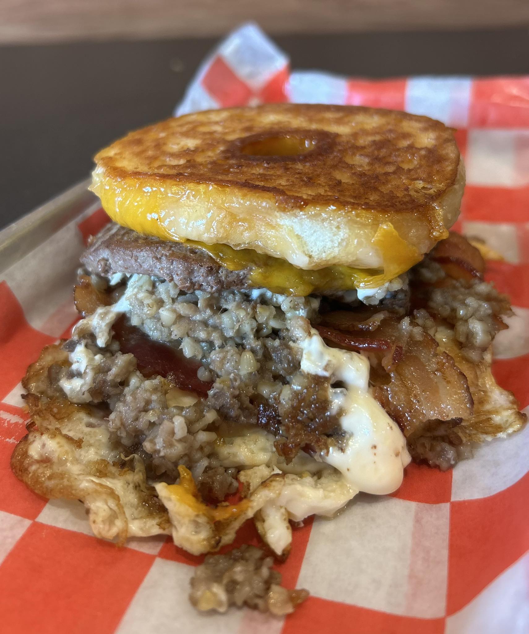 Tom - Introducing the Grilled Chee Donut Burger! 100% pure ground beef ...