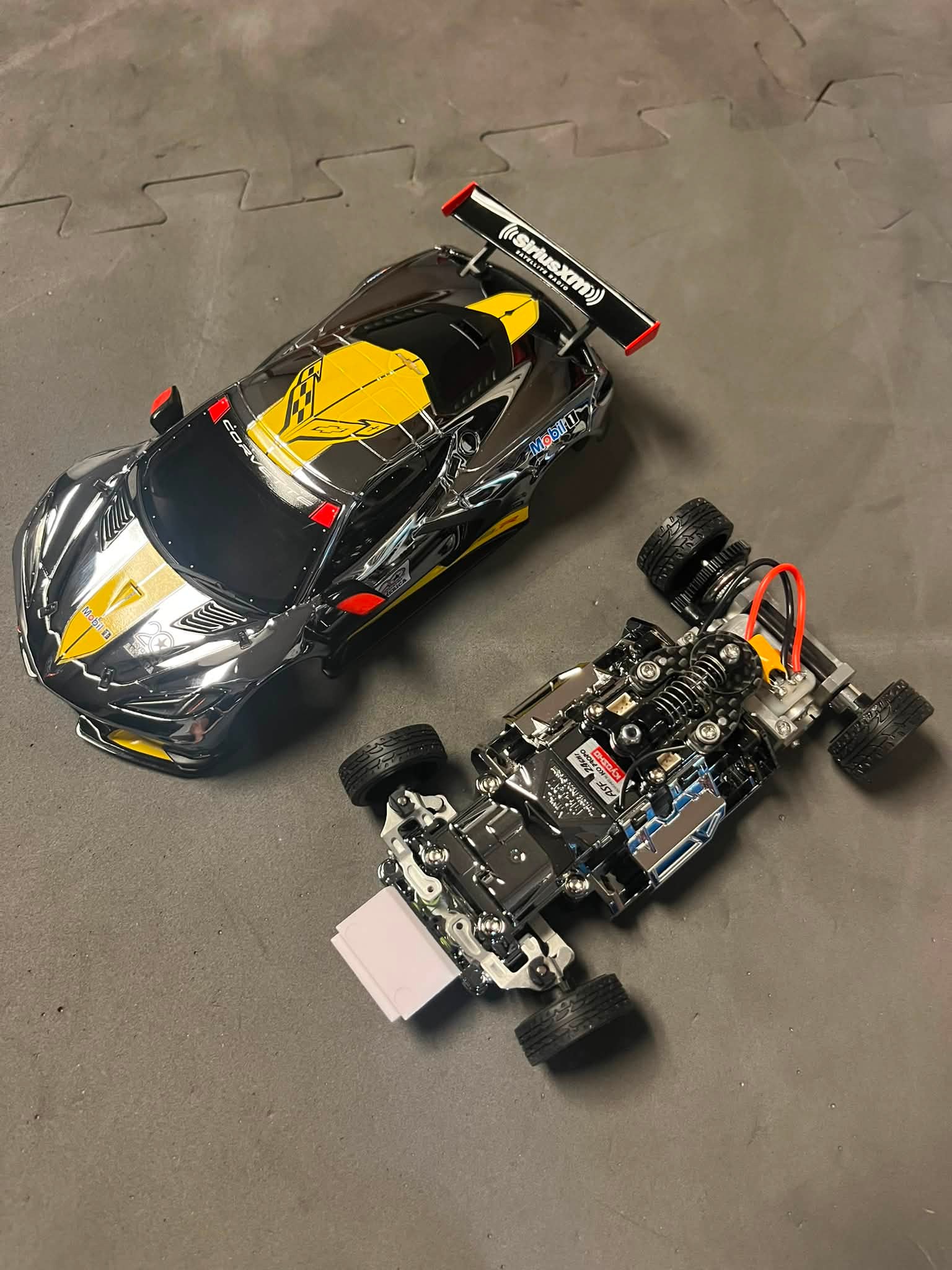 Mini-Z car with chrome chassis on display