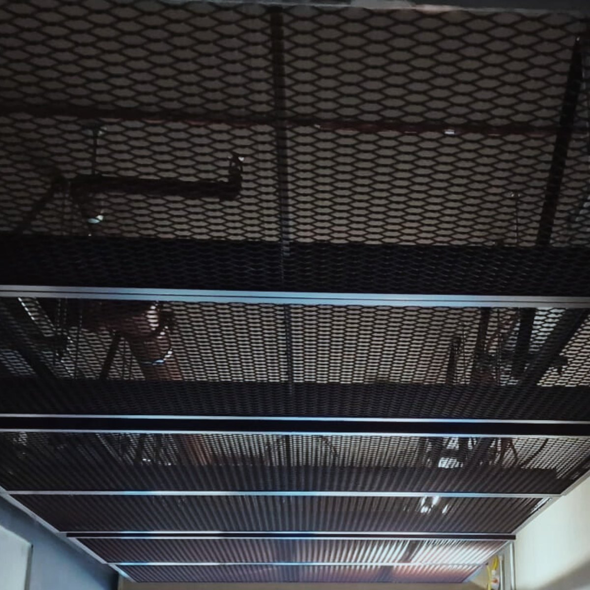 Access - Industrial vibes, engineered to perform. Our mesh ceilings ...
