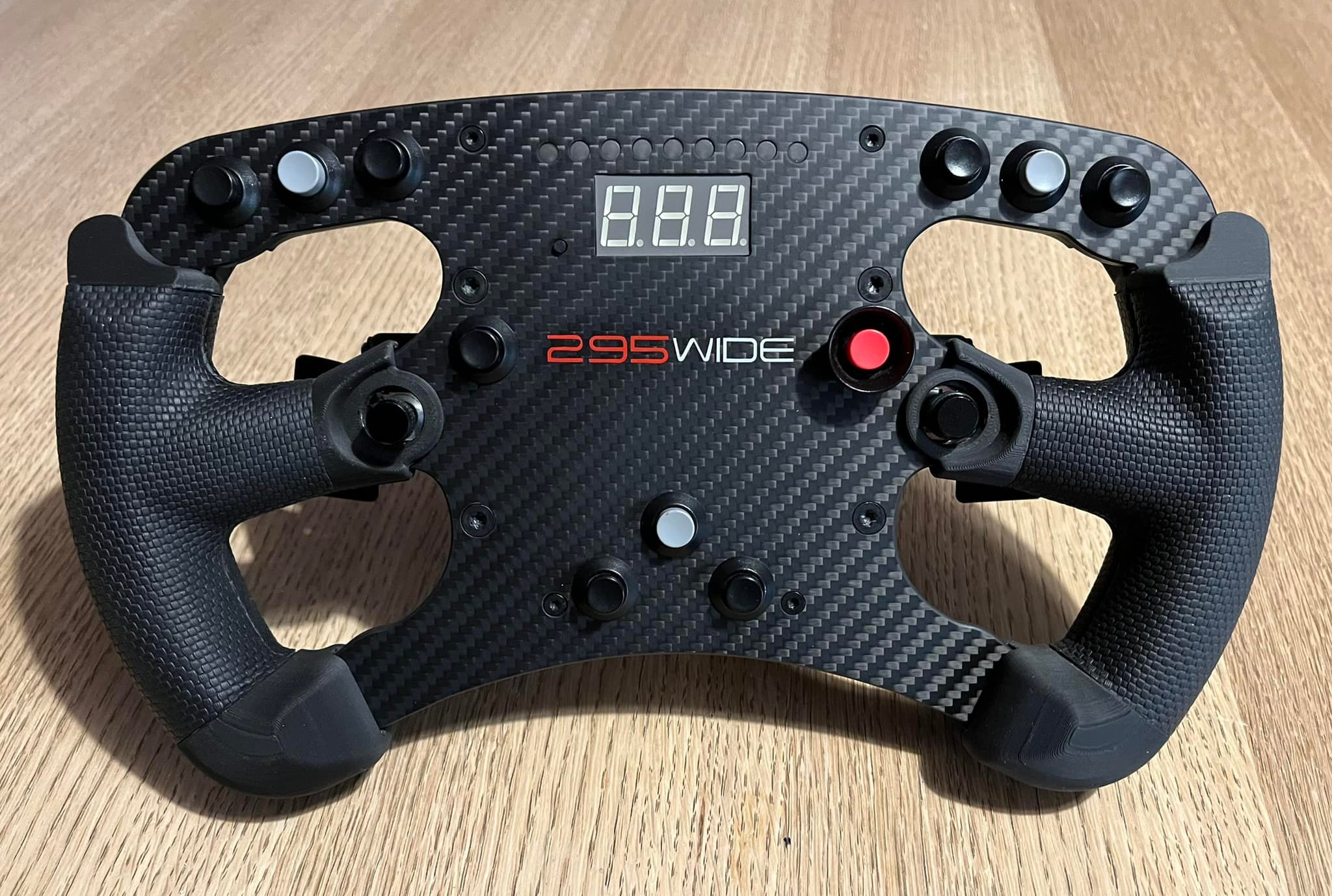 Modified Fanatec formula wheels for sale with carbon fibre plates
