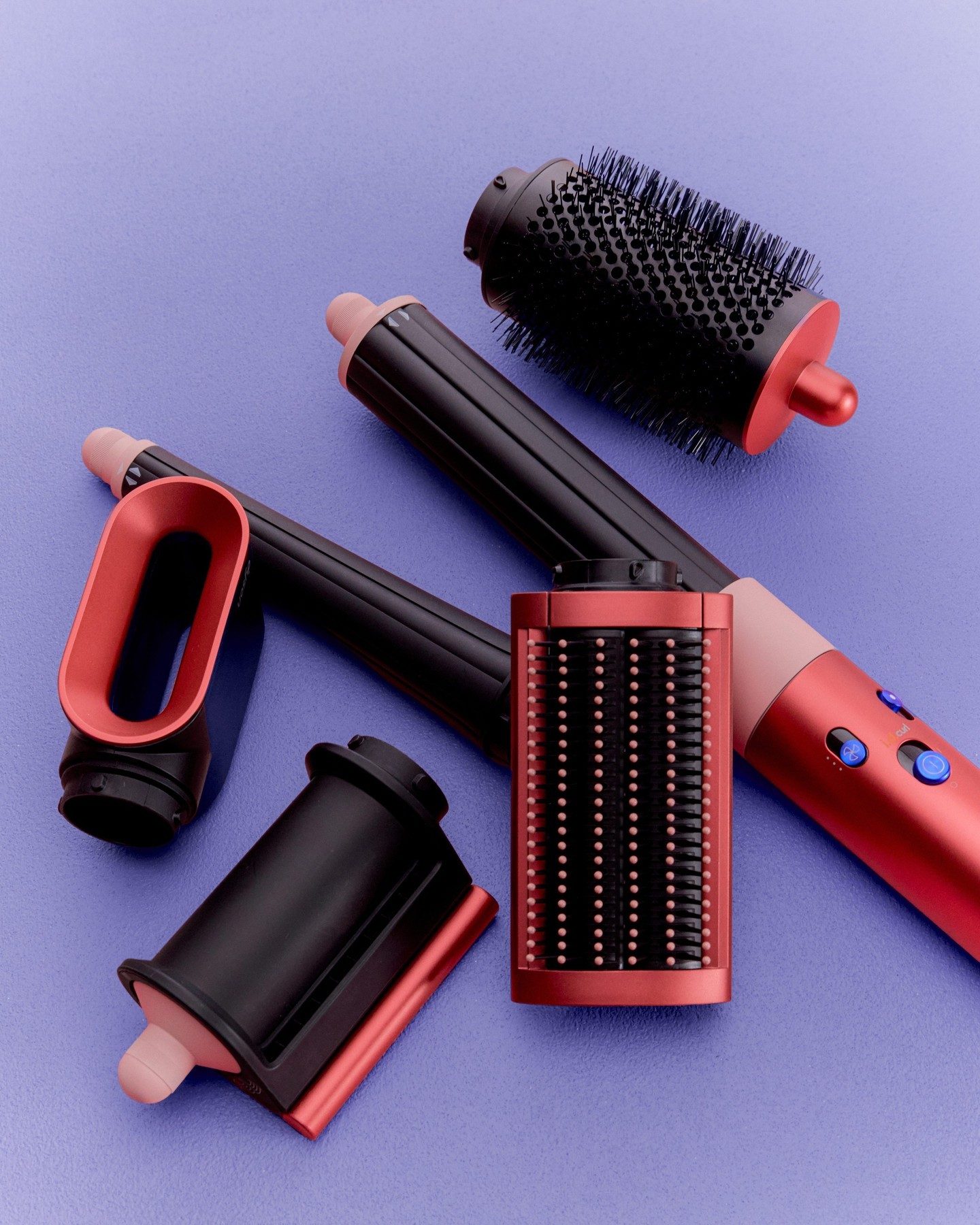 Perfect curls in pink or purple. Meet the Dyson Airwrap i.d™ multi