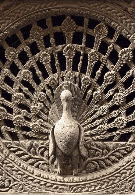 マユル　ザャ( PEACOCK window) Carved in the 18th century, the Peacock Window (Mayur Jhyal) in