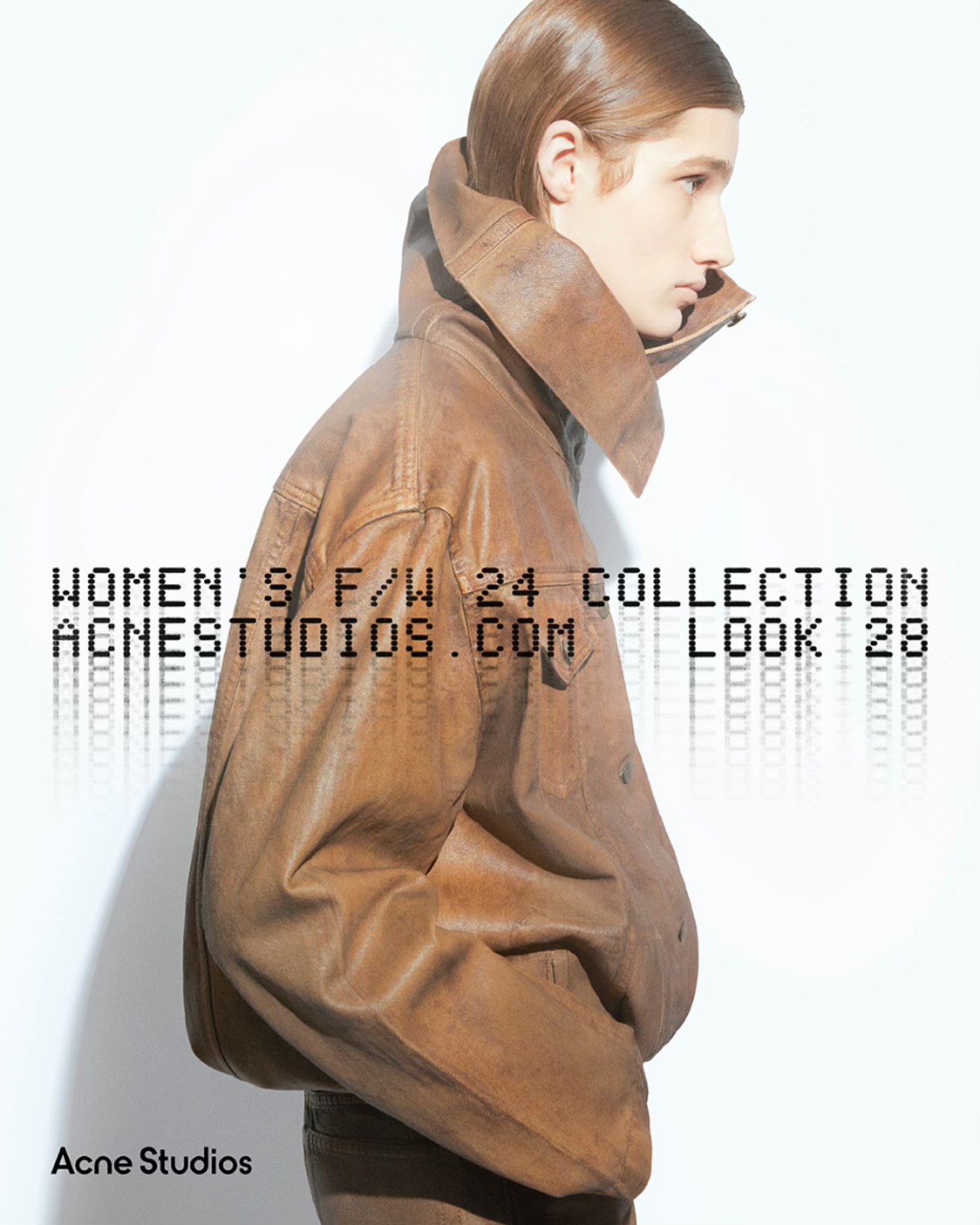 FW24 coated denim is reinvented with elongated collar and pleated 