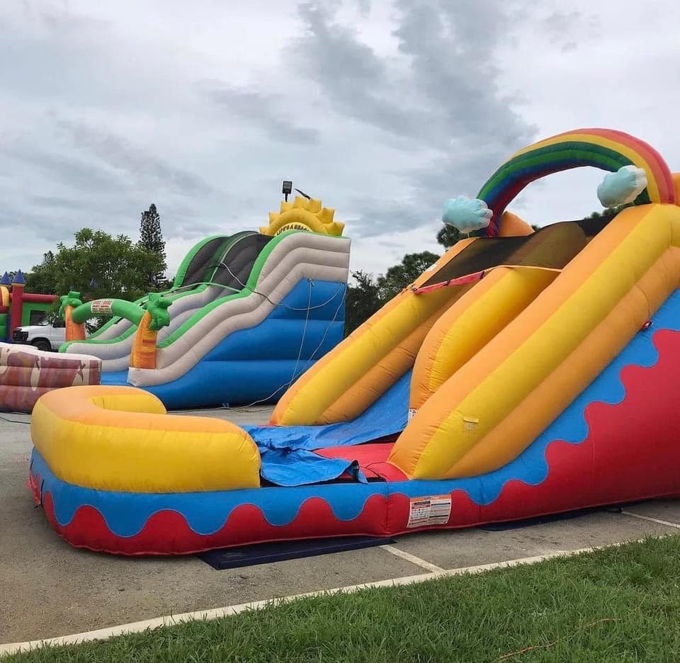 Joe Perron’s inflatable bounce houses and water slight for rents