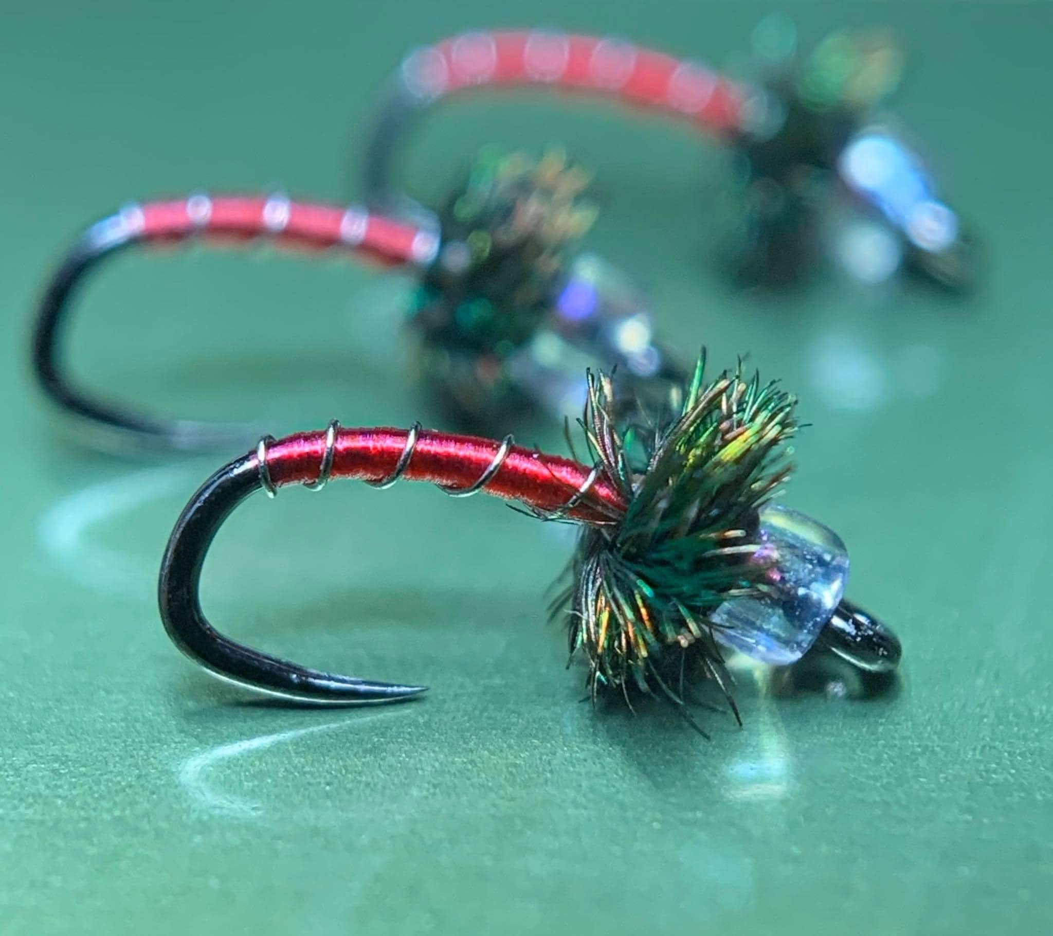 Mercury Blood Midge. Killer Caddis midge glass bead used along