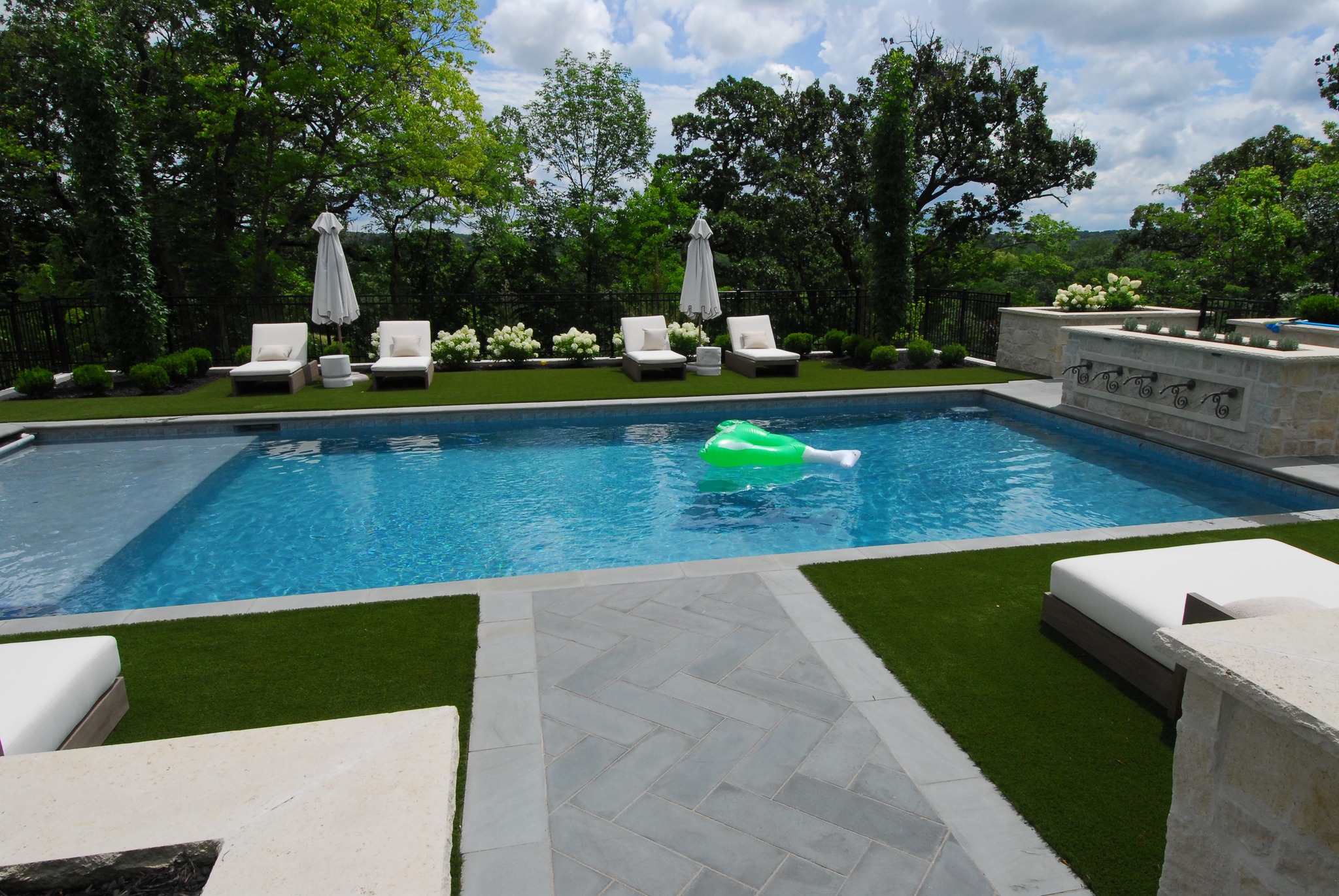 Complete Pools - What a stunner! Grey quartz, wall with...