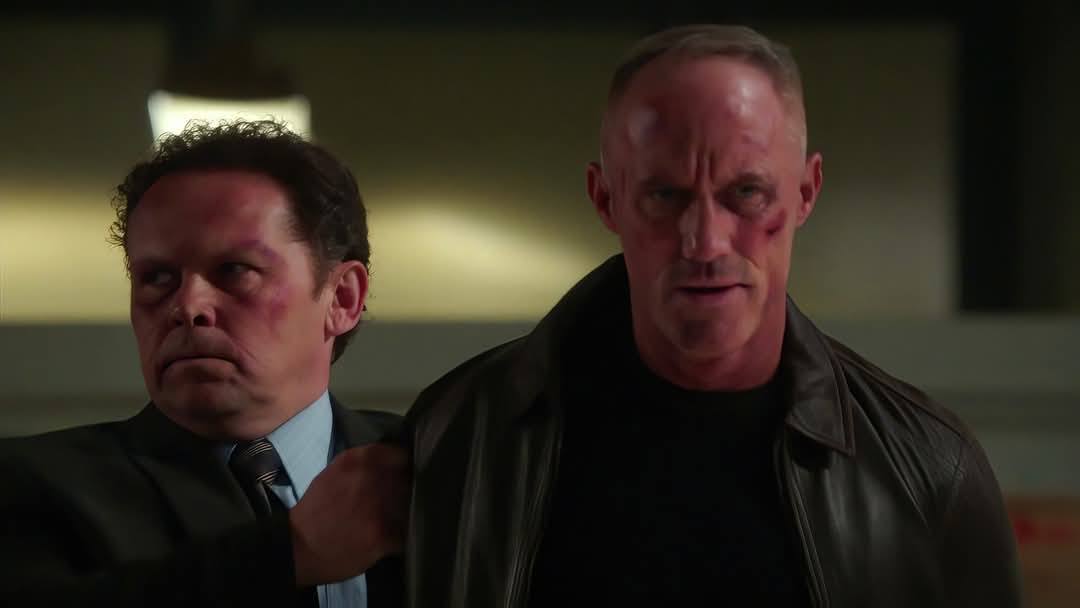 Detective John Riley