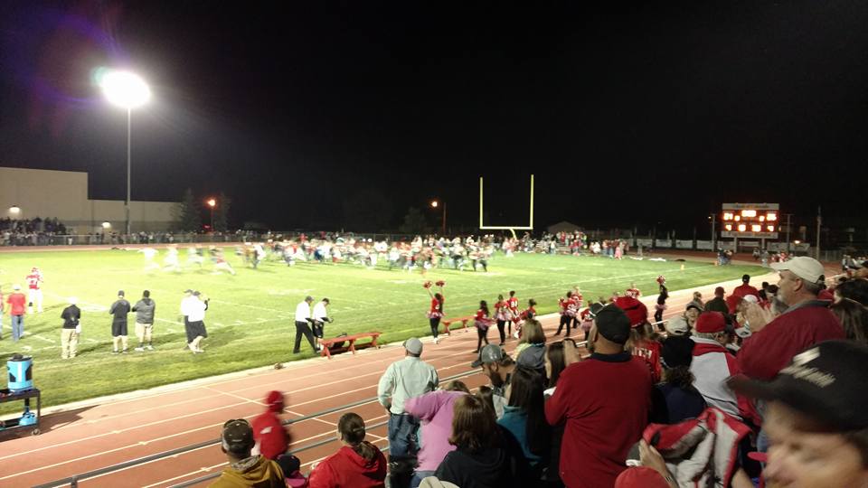 Eaton Reds - The student section rushes the field to... | Facebook