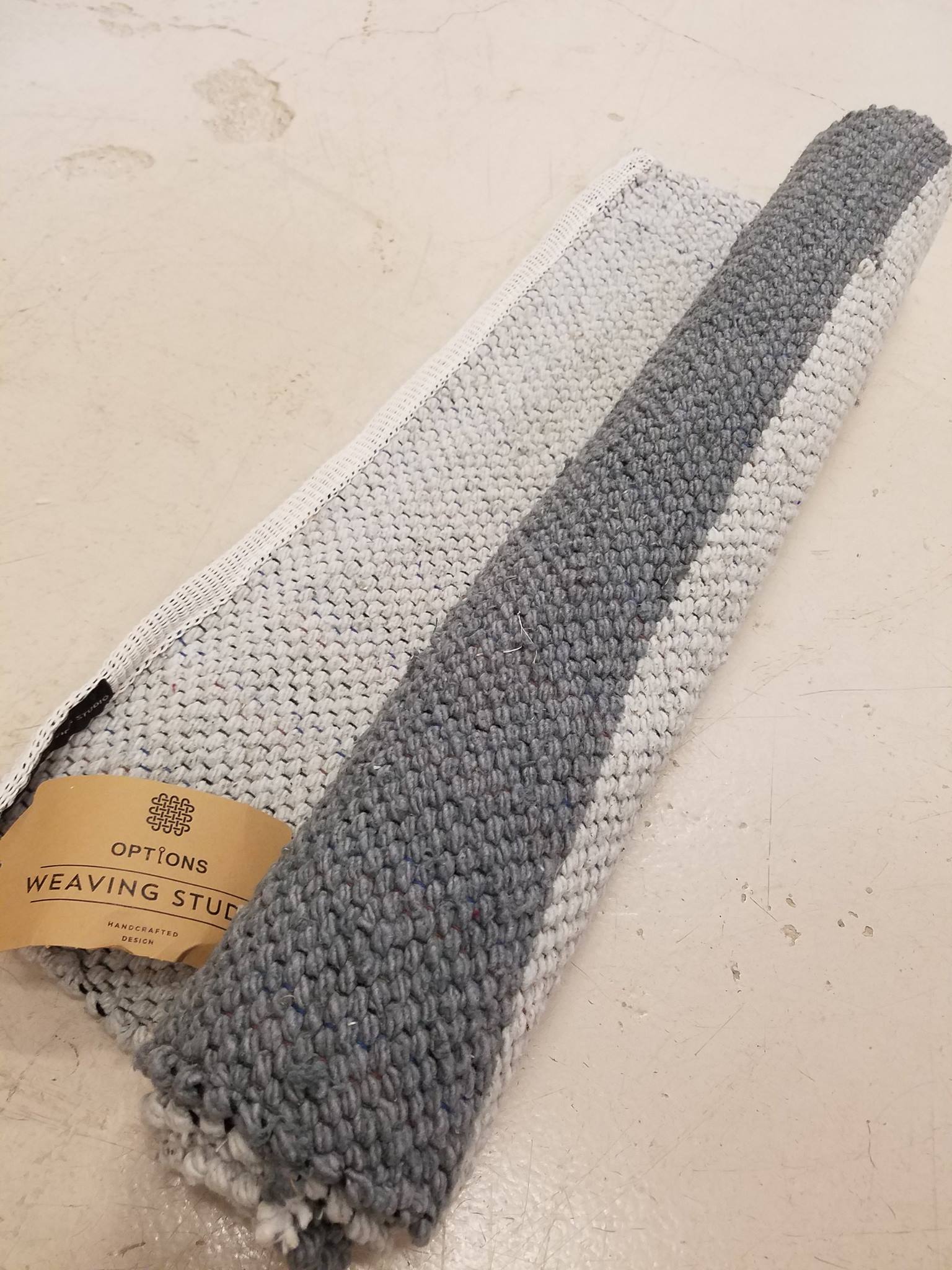 Our new mop cotton rug has been a... - OPTIONS Weaving Studio | Facebook