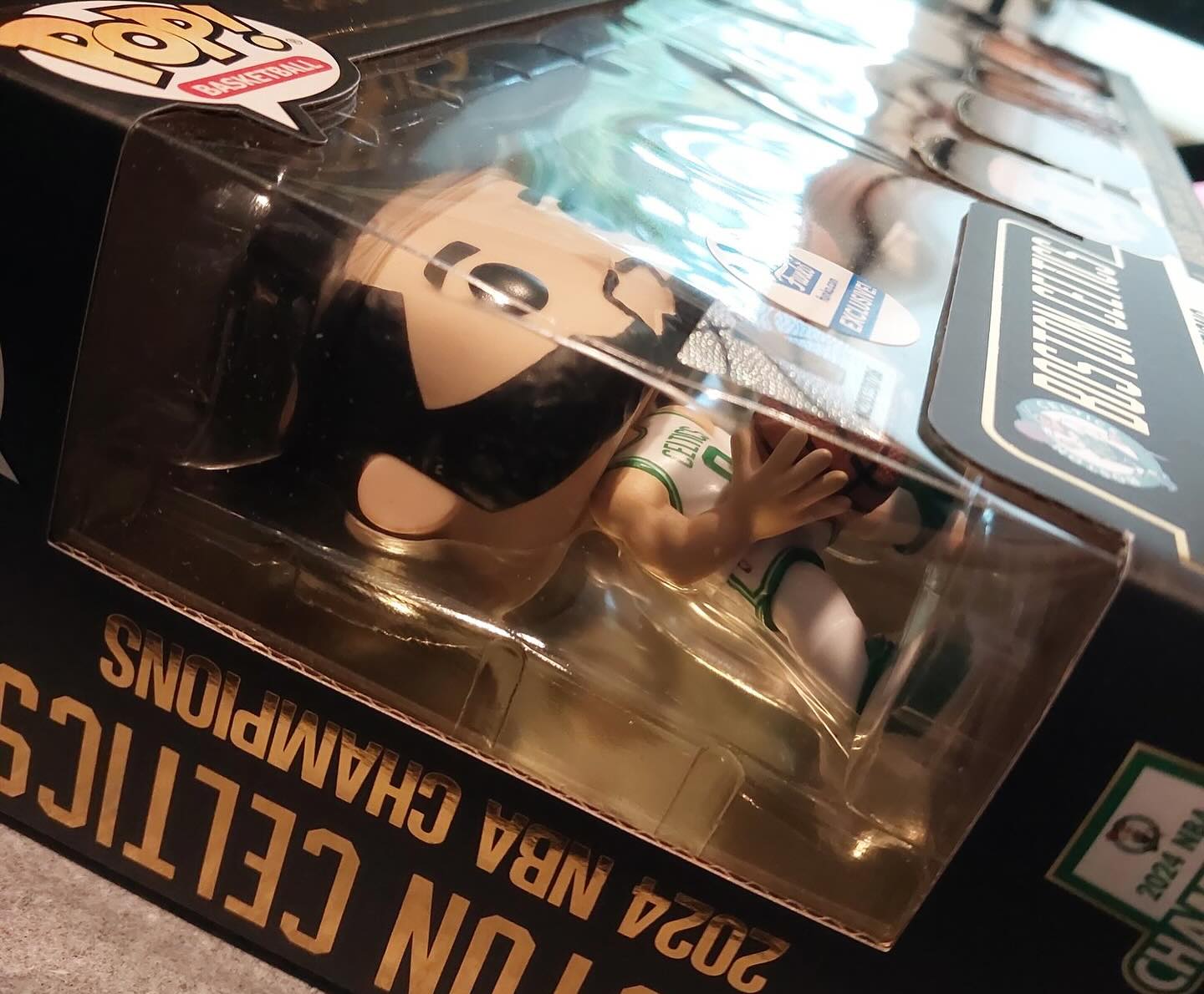 In hand with the Boston Celtics 2024 NBA Champions Funko POP! 5  display picture 1