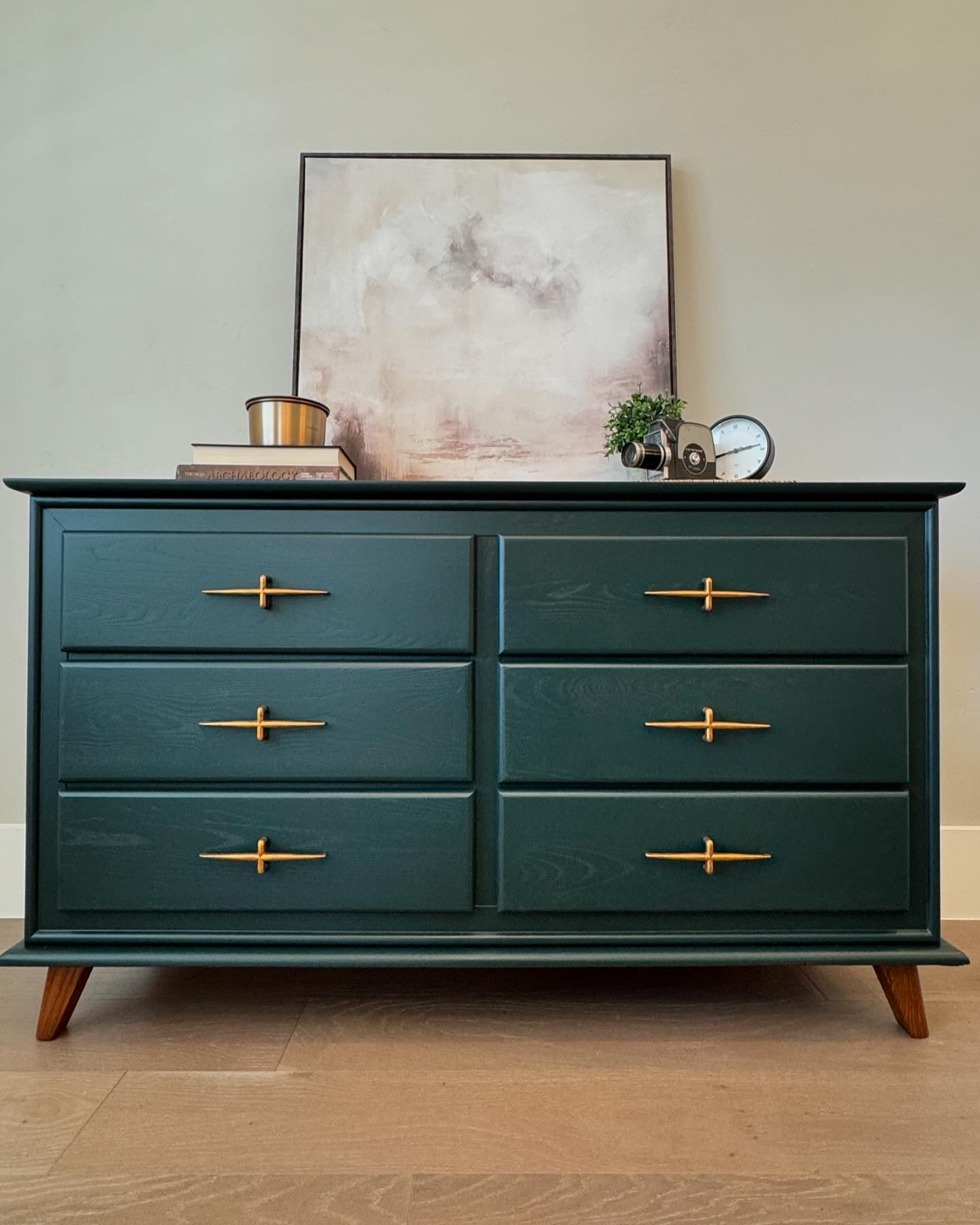 dark green dresser bedroom with gold hardware at River City Event Qipao