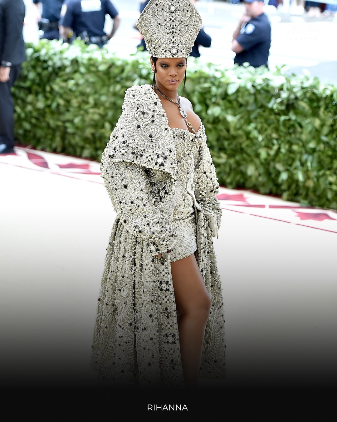 rihanna beaded dress shut down the carpet in papal couture, rocking a crystal-covered Maison Margiela look with a mitre to match. 🔥 silver dress