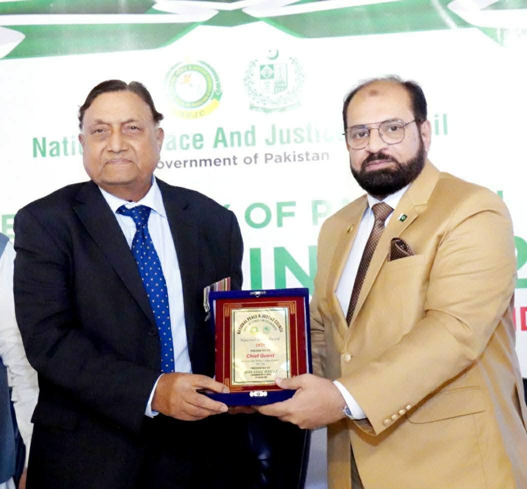 Mian Abdul Waheed chairman NPJC presenting the 