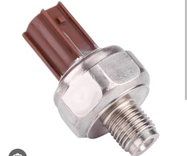 How to access the 65551 knock sensor on a vehicle