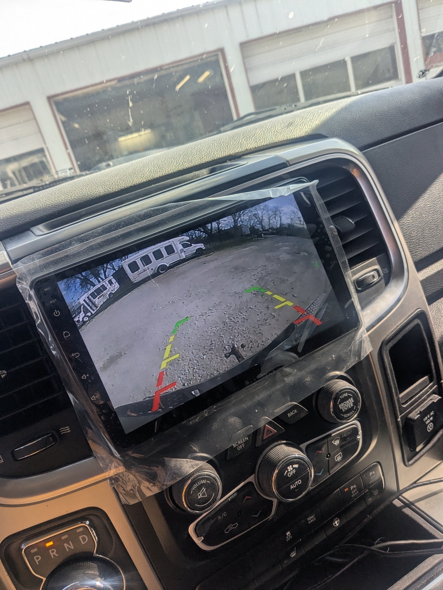 Android AJ002-OB with Android Auto and Apple CarPlay. Has a rear
