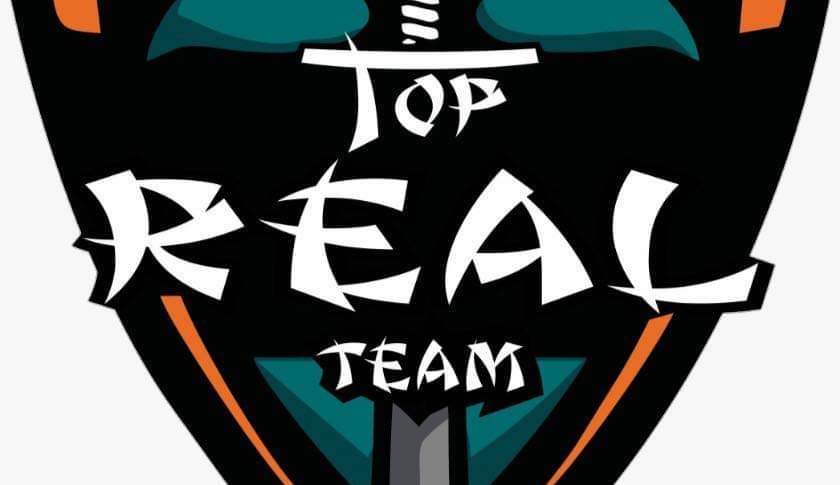 Top→Reals Team
