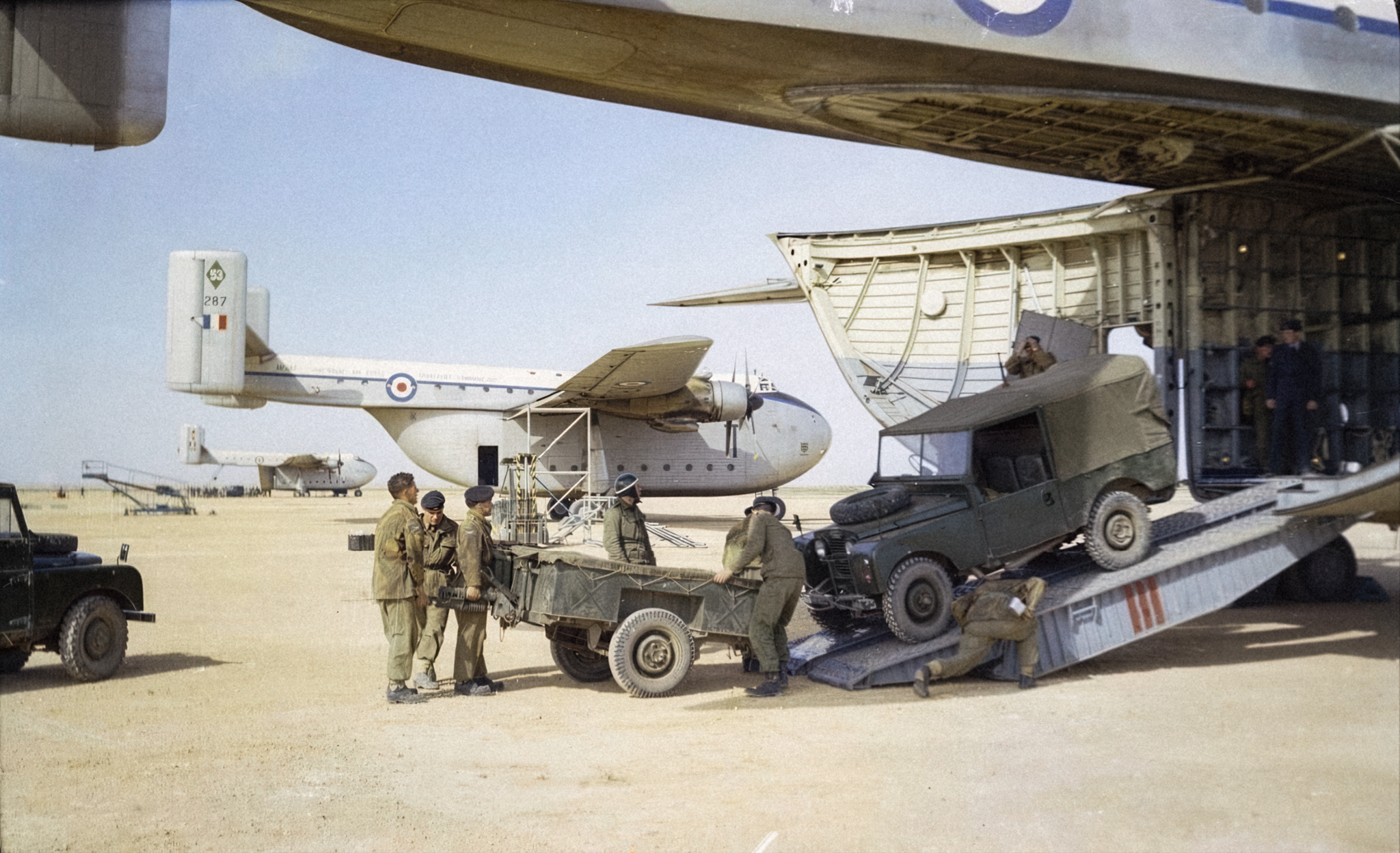 Jets - Despatchers of the Royal Army Service Corps load a Land Rover of ...