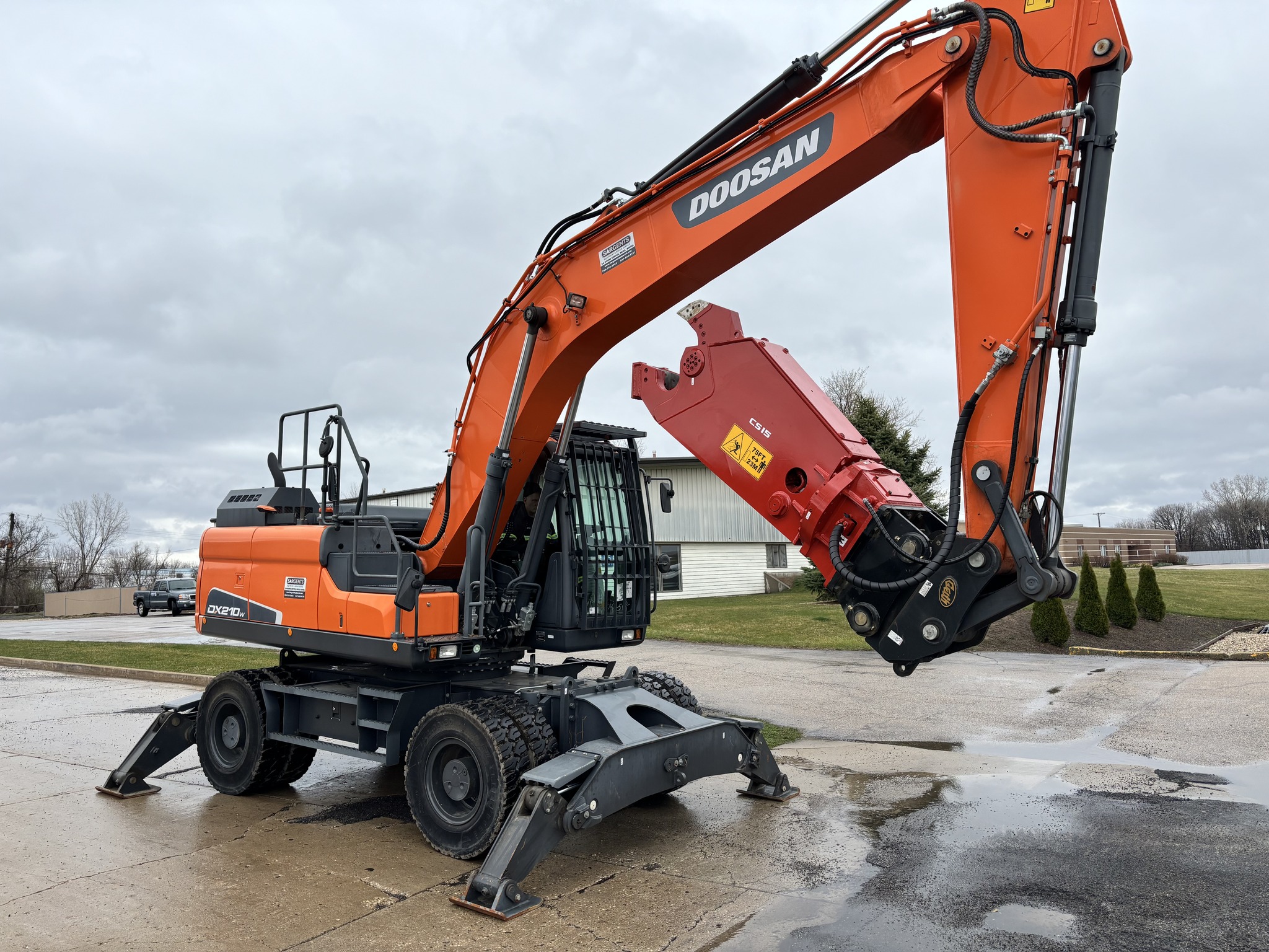 Sargents - Our wheeled excavator paired with a high-performance shear ...