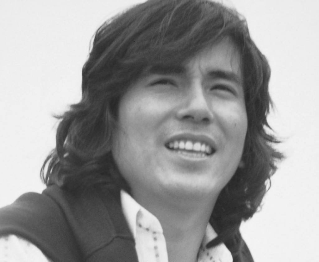 田村 俊 磨