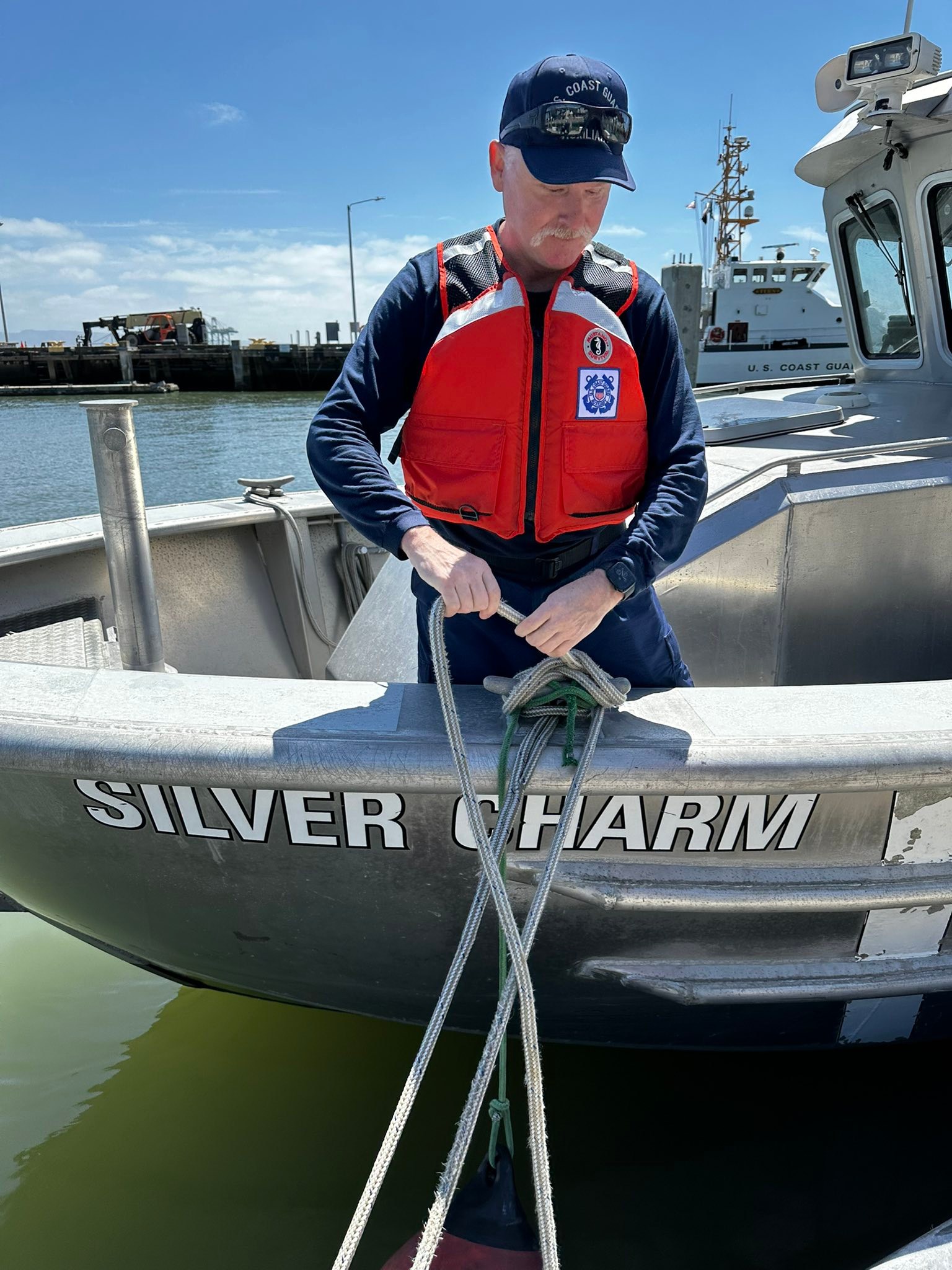 U.S. - Silver Charm, crew Jeff Grave tying off mooring lines | Facebook