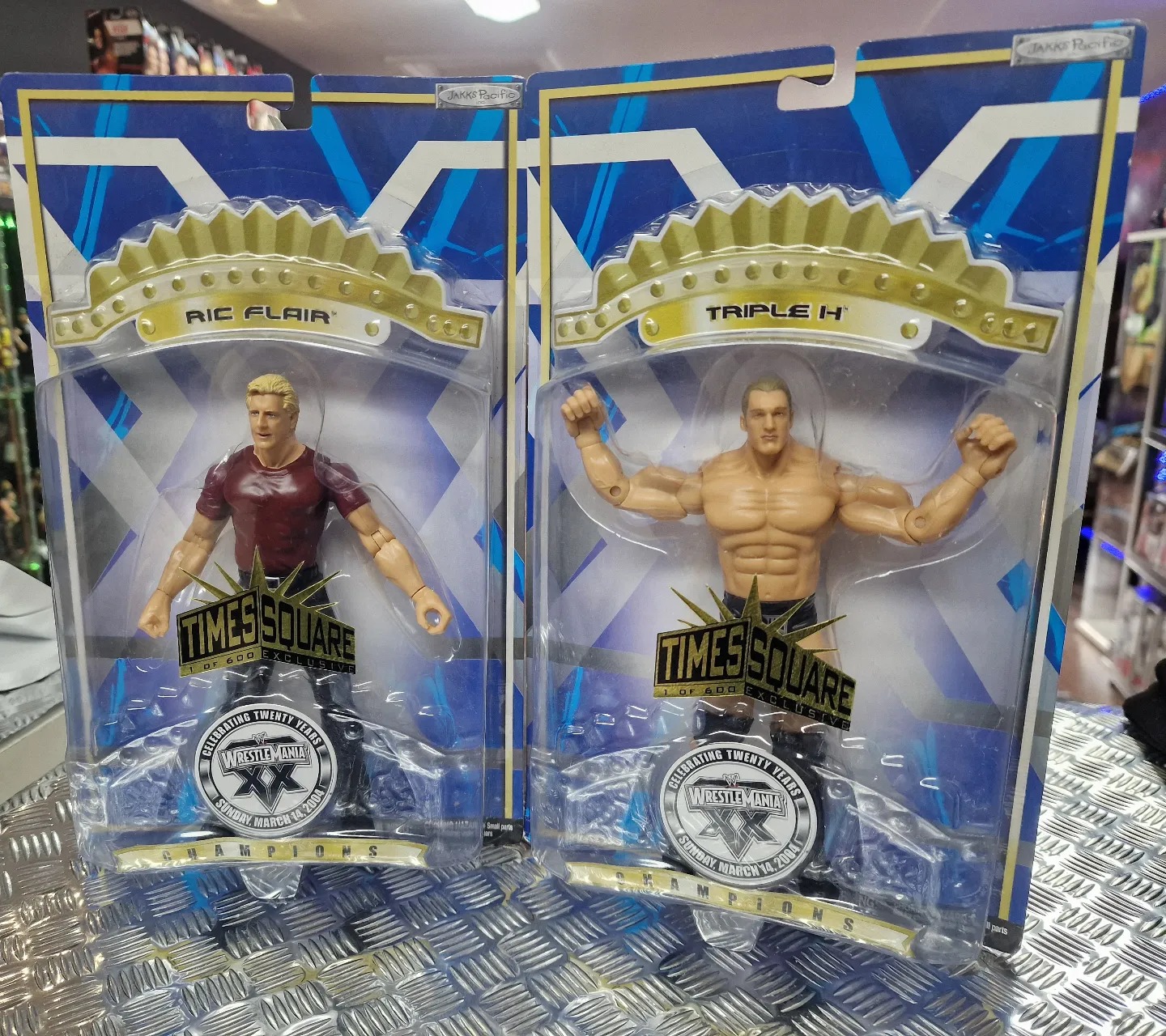 Ric Flair and Triple H signed wrestling figures