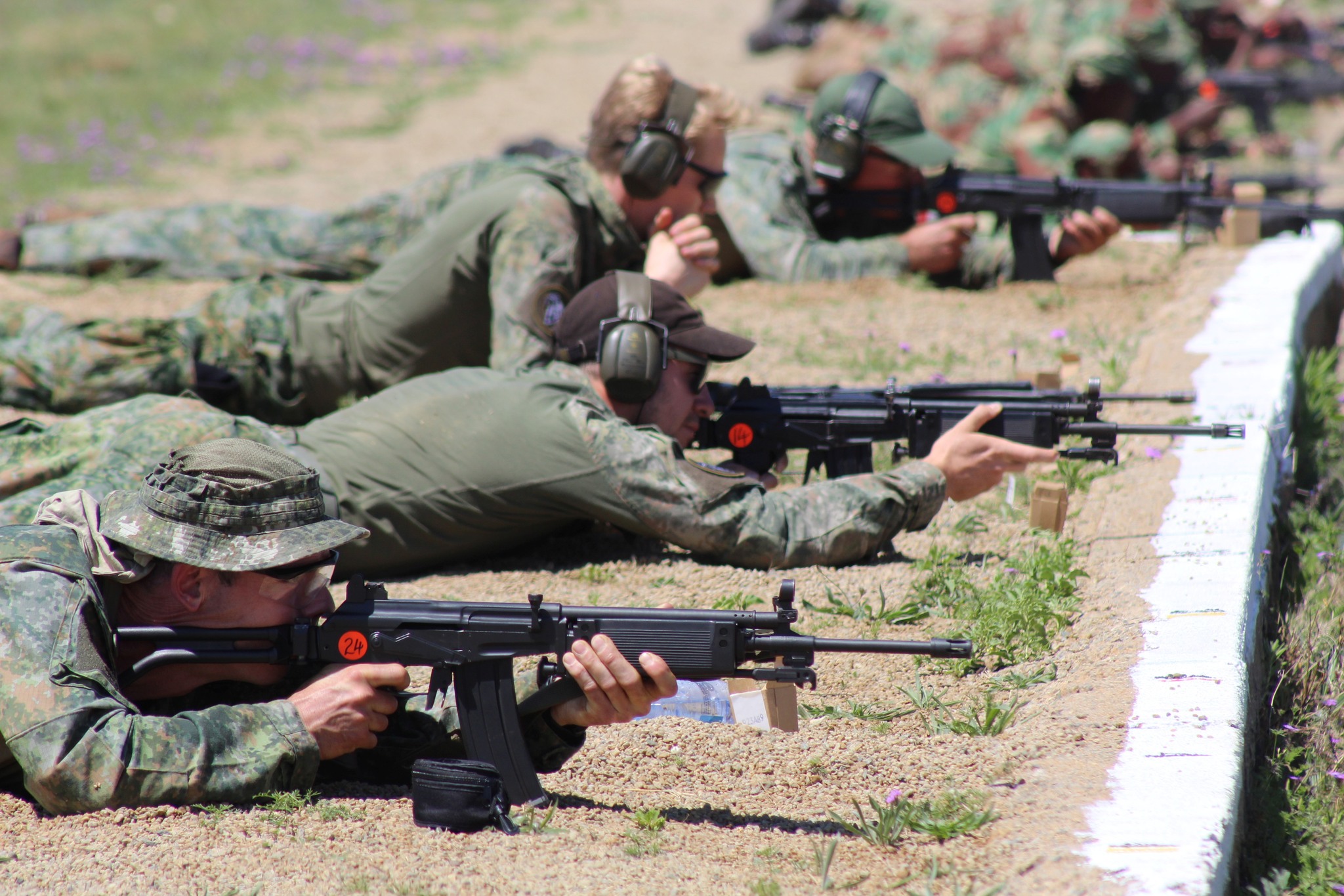 SA - Dutch participants firing their R4 assault rifles, during the ...