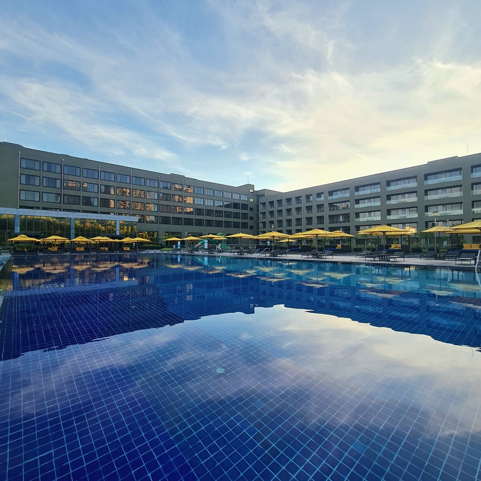 Hilton - Rise and shine! An early swim at Hilton Clark is the perfect ...
