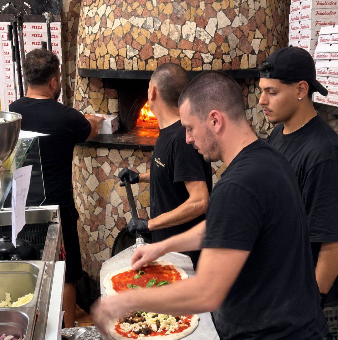Fresh Pizza Ready for the Wood-Fired Oven 🔥🍕 #WoodFiredPizza #PizzaMaking #PizzaLovers | BiteNomica