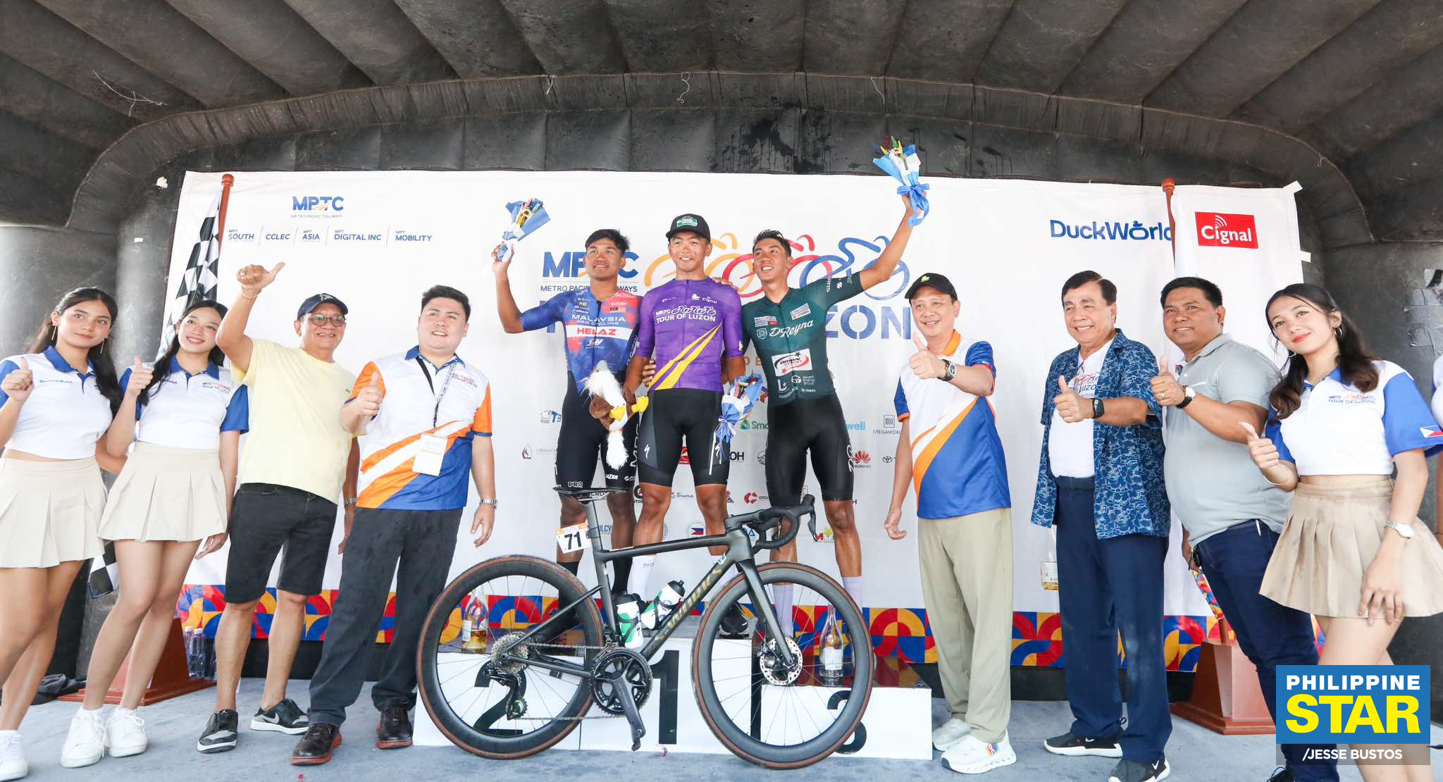 Philippine - Cyclists pedal through the third stage of the Metro ...