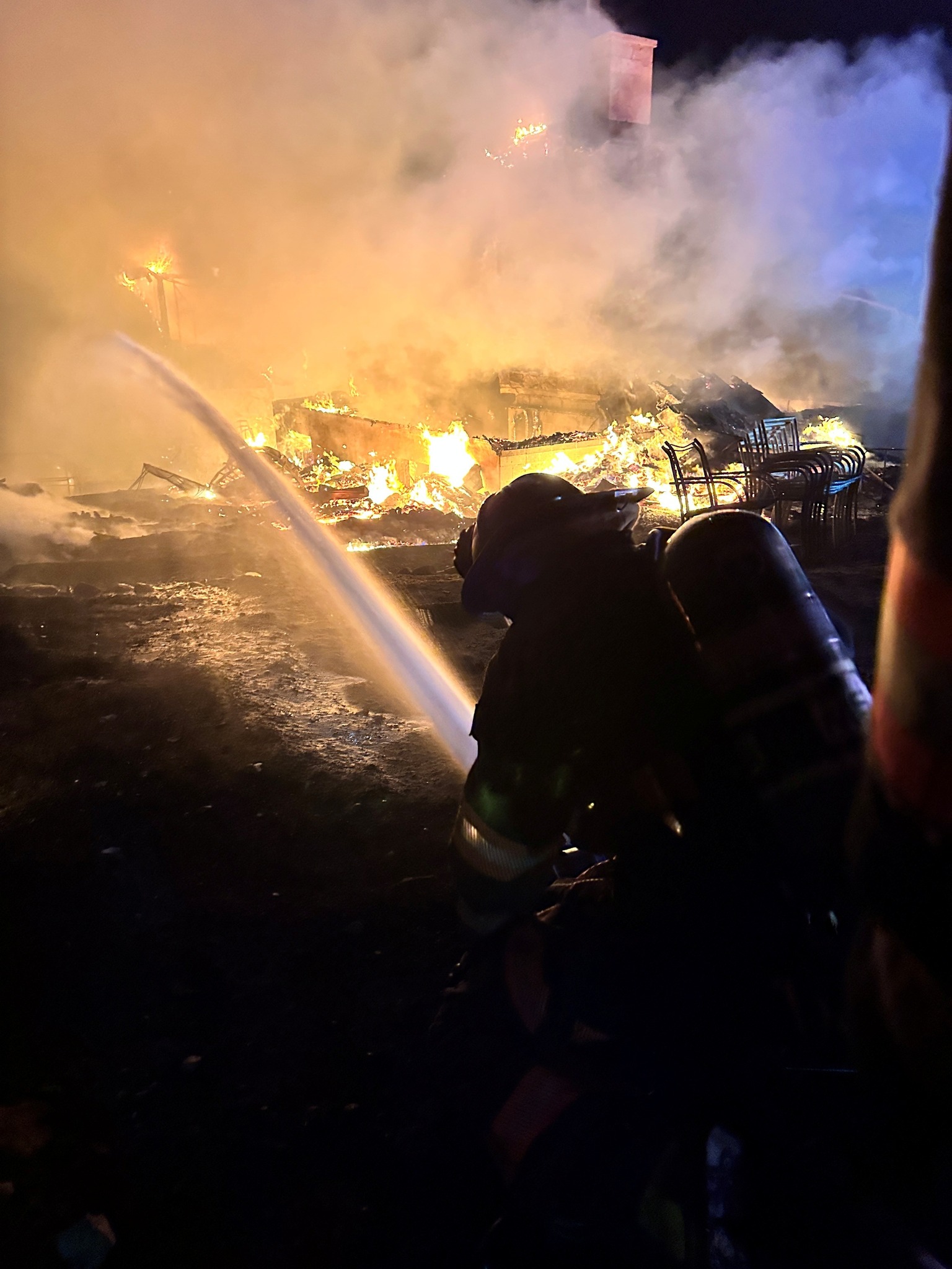 Roaring - Fire man spraying water on fire | Facebook
