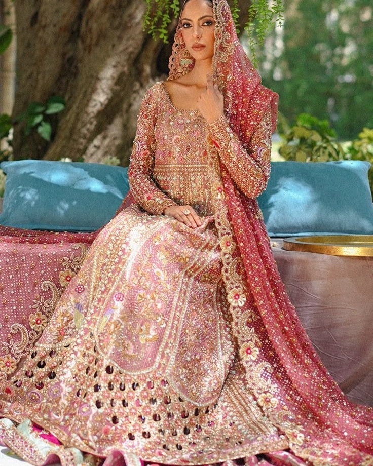 hot pink pakistani wedding dress A dreamy blend of and gold, woven with love and light❤️ #pakistanibridalwear #designerwear #bridallehngas #designerbridalwear #bridalboutique #HandEmbroidery #weddingformals #gharara #pakistanstreetstyle #mehndioutfits #nikkahoutfit #formalwear Taupe bias cut satin gown
